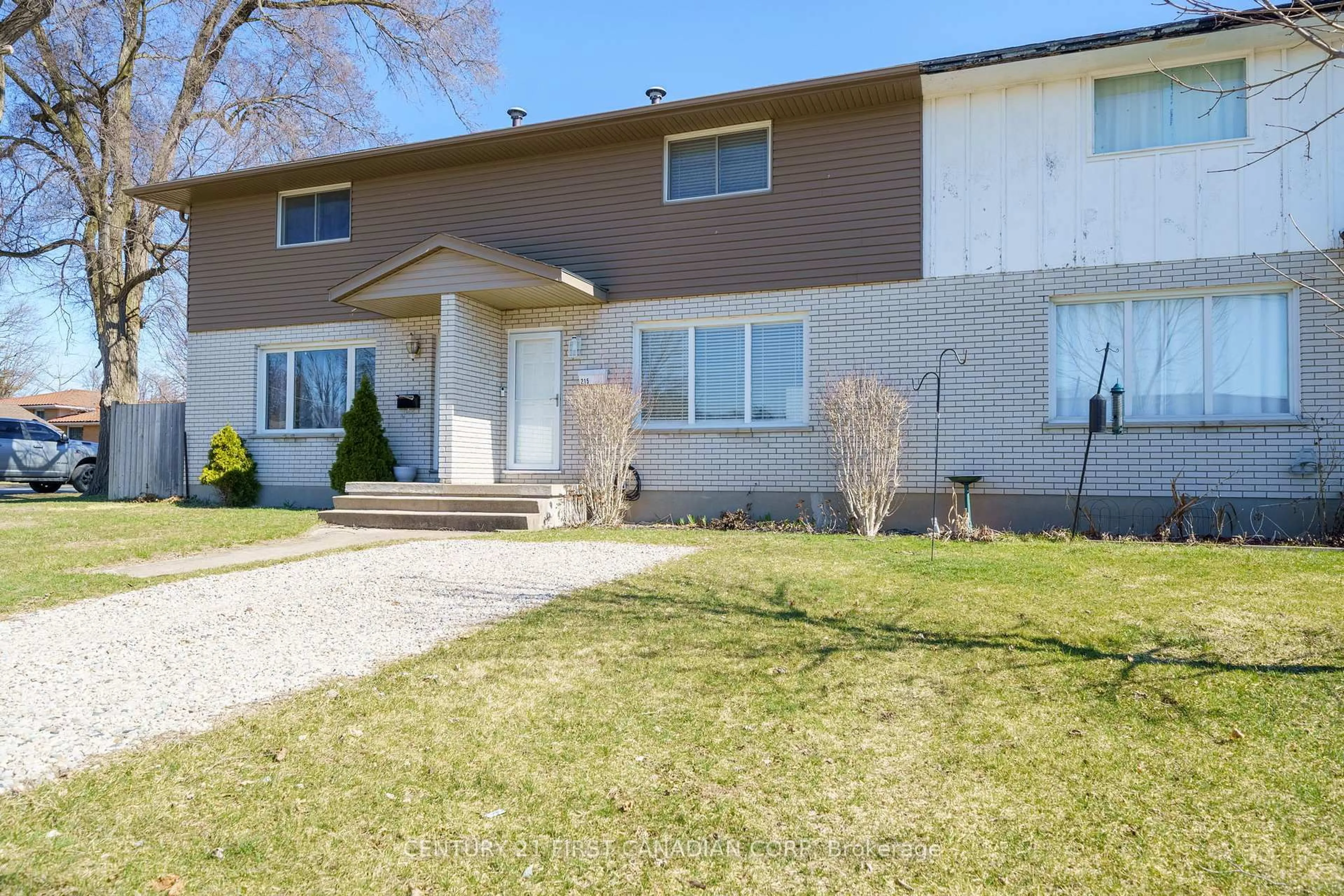 Home with vinyl exterior material, street for 215 Beattie St, Strathroy-Caradoc Ontario N7G 2X3