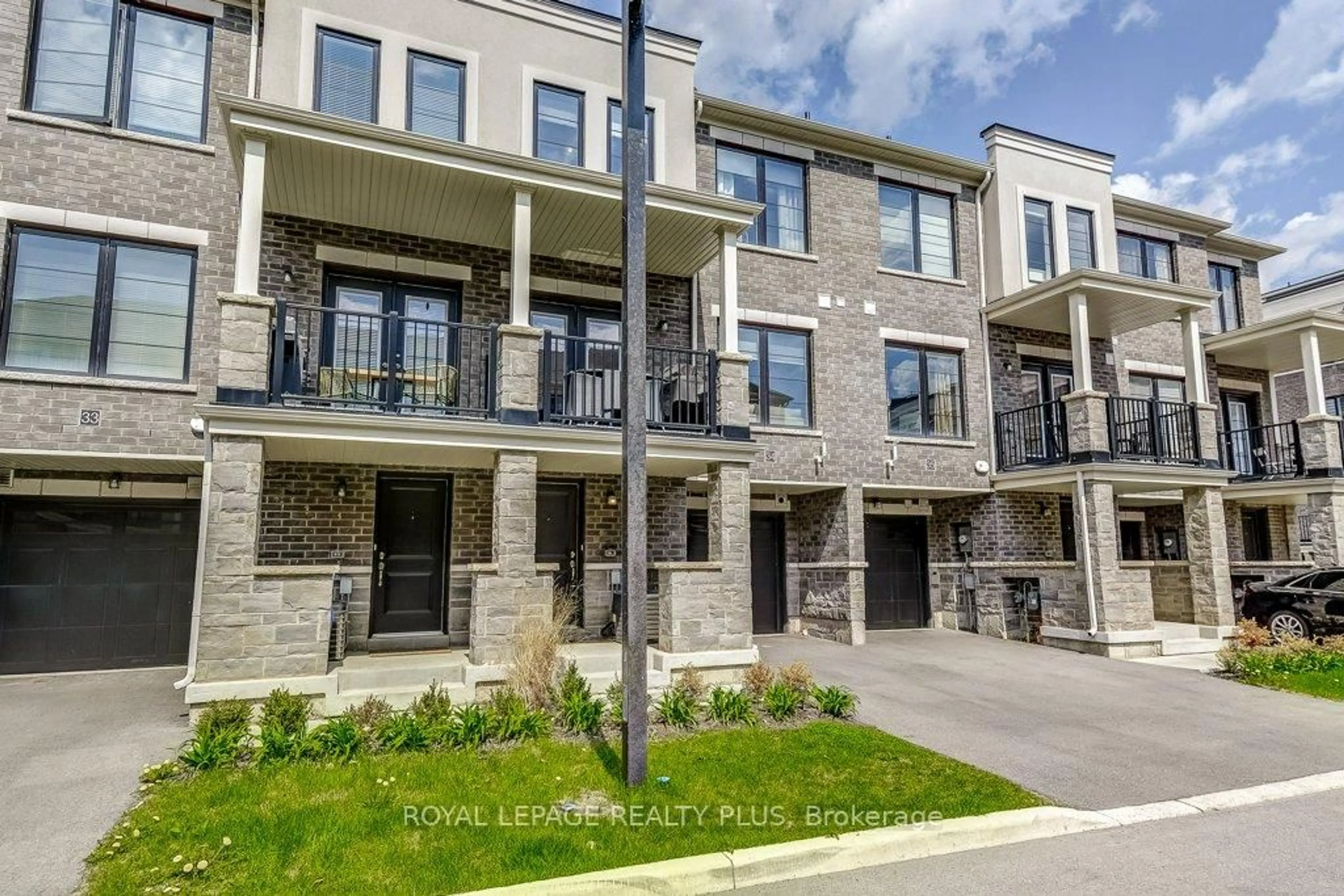 Home with brick exterior material, street for 383 Dundas St #34, Hamilton Ontario L8B 1X6