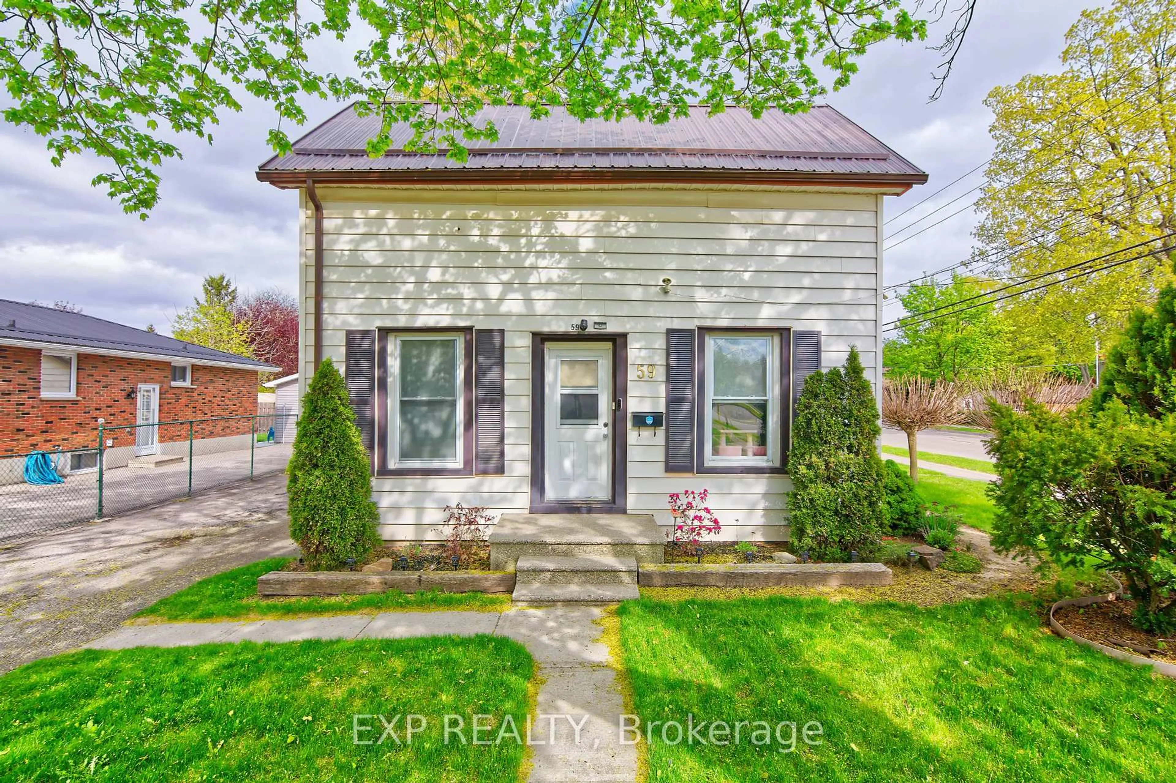 Home with brick exterior material, street for 59 St George St, Aylmer Ontario N5H 2M2