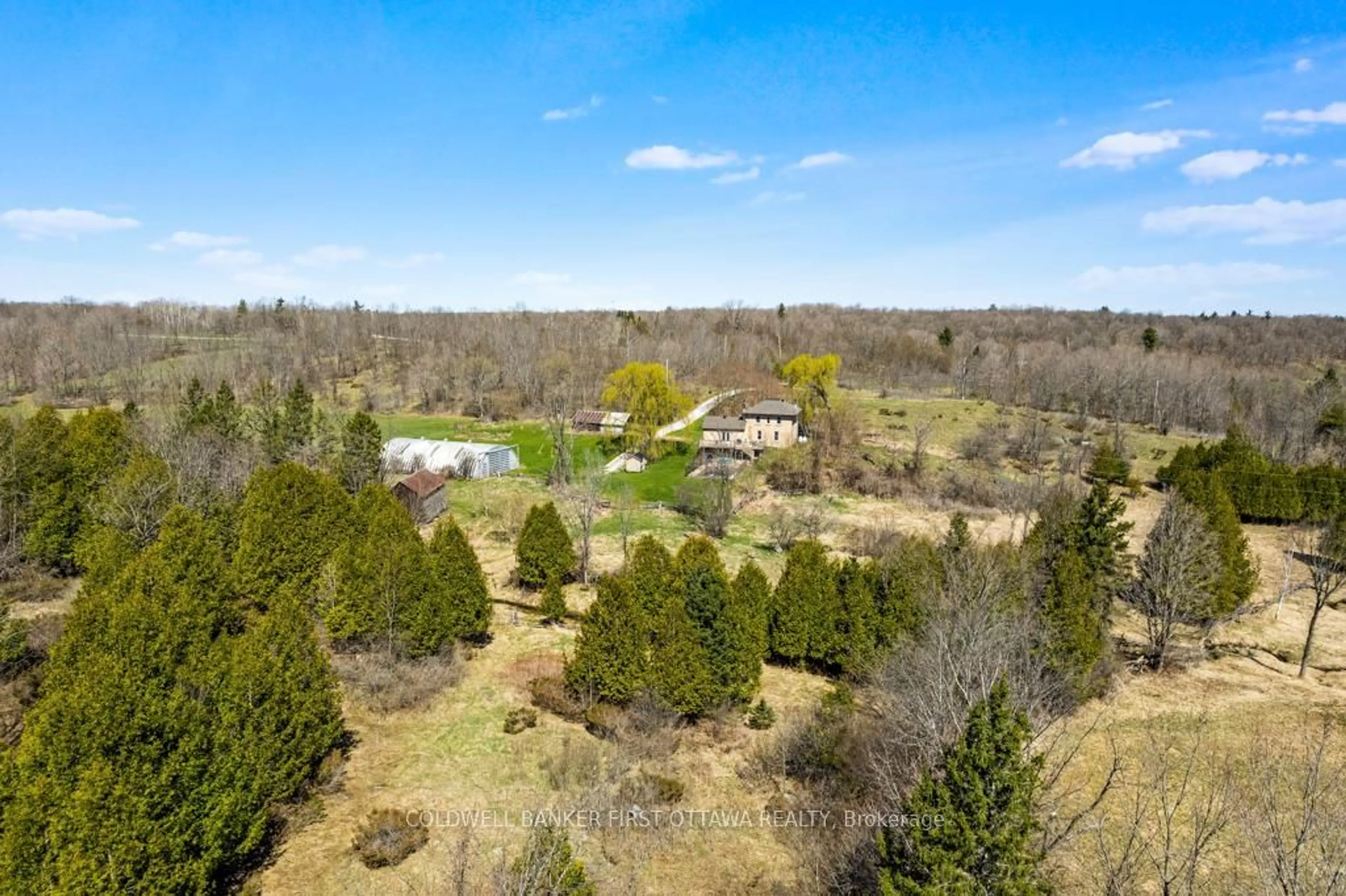A pic from outside/outdoor area/front of a property/back of a property/a pic from drone, forest/trees view for 461 Fagan Lake Rd, Maberly Ontario K0H 2B0