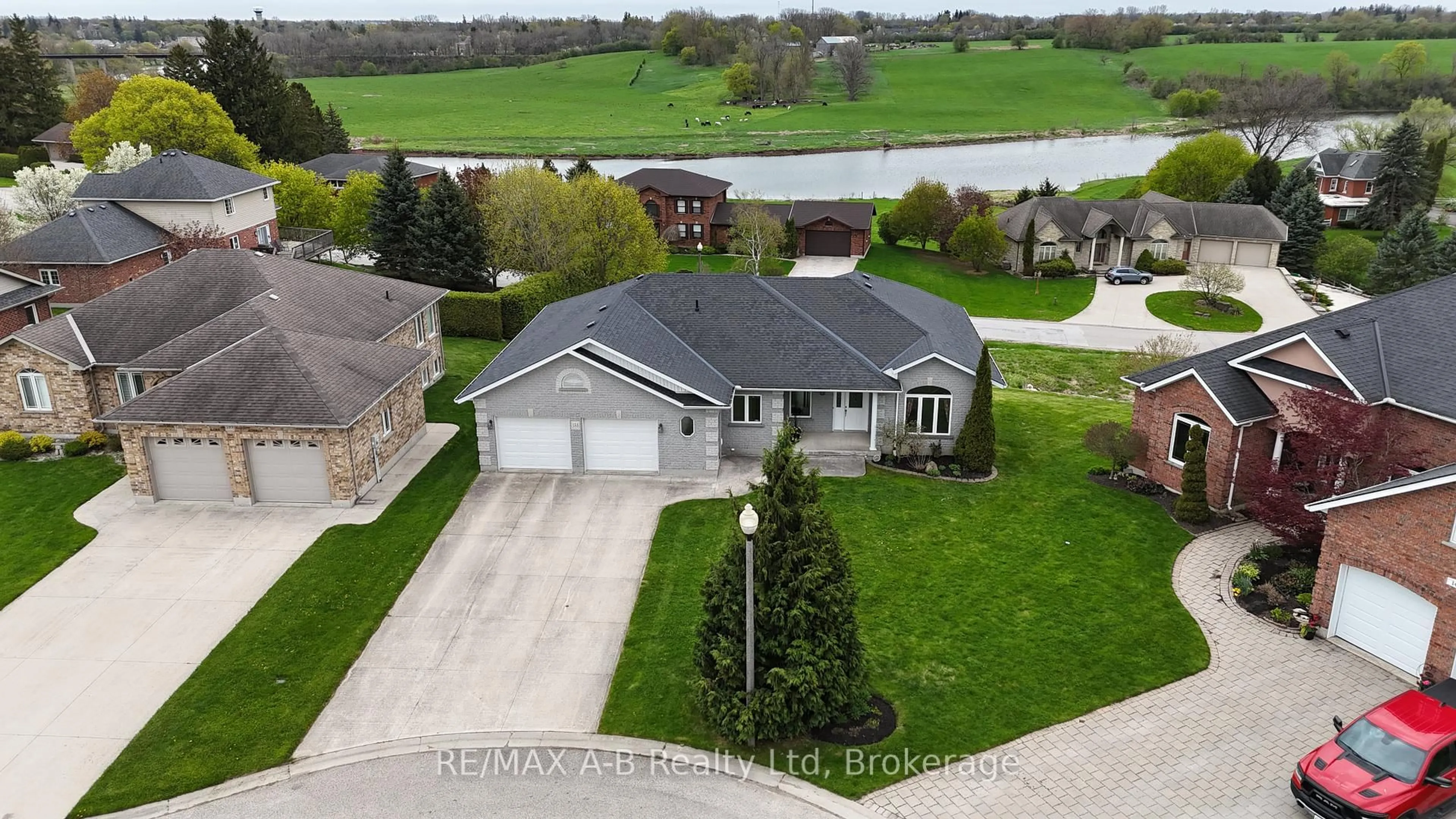 A pic from outside/outdoor area/front of a property/back of a property/a pic from drone, water/lake/river/ocean view for 153 Thamesview Cres, St. Marys Ontario N4X 1E1
