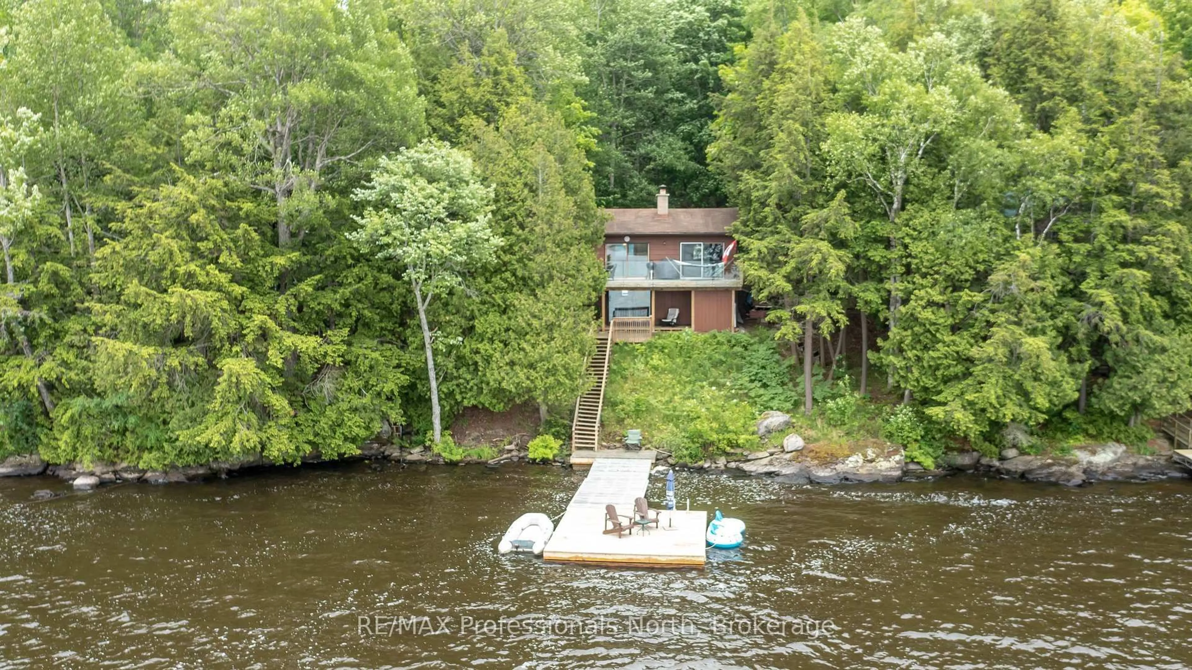 A pic from outside/outdoor area/front of a property/back of a property/a pic from drone, water/lake/river/ocean view for 1158 Shea Rd #23, Muskoka Lakes Ontario P0B 1M0