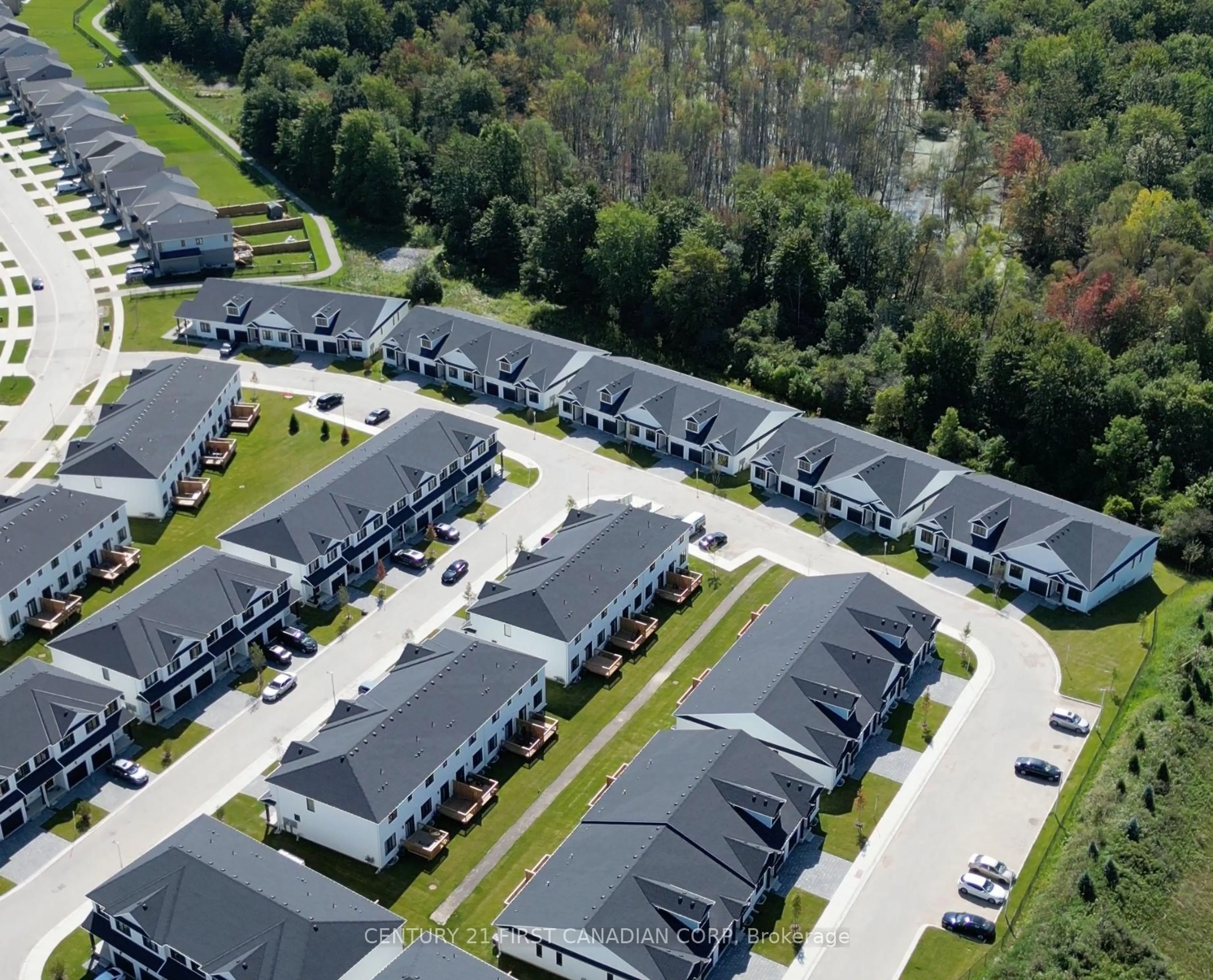 A pic from outside/outdoor area/front of a property/back of a property/a pic from drone, street for 1068 Trailsway Ave, London South Ontario N6K 0H9