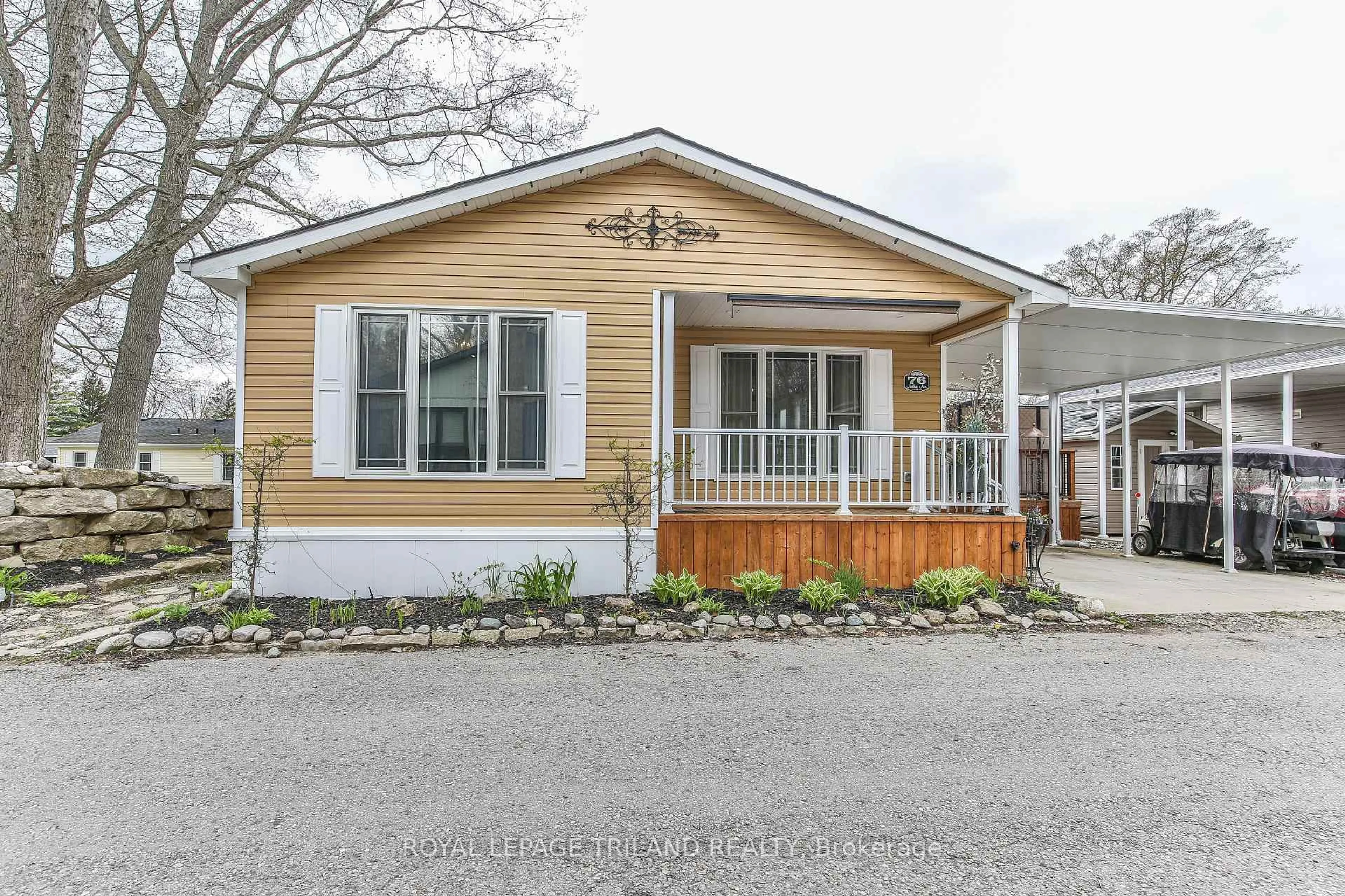 Home with vinyl exterior material, street for 22790 Amiens Rd #76, Middlesex Centre Ontario N0L 1R0