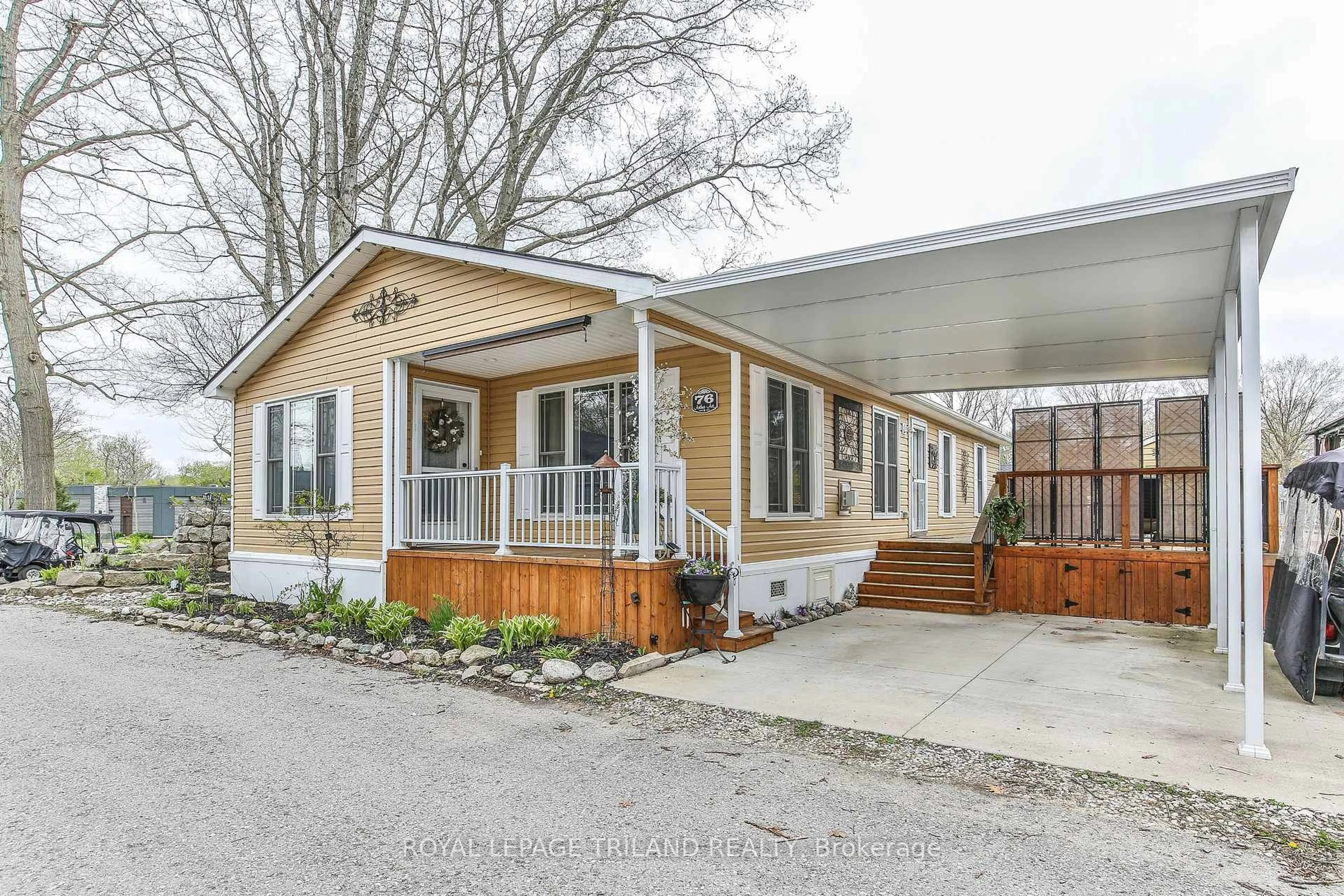 Home with vinyl exterior material, street for 22790 Amiens Rd #76, Middlesex Centre Ontario N0L 1R0