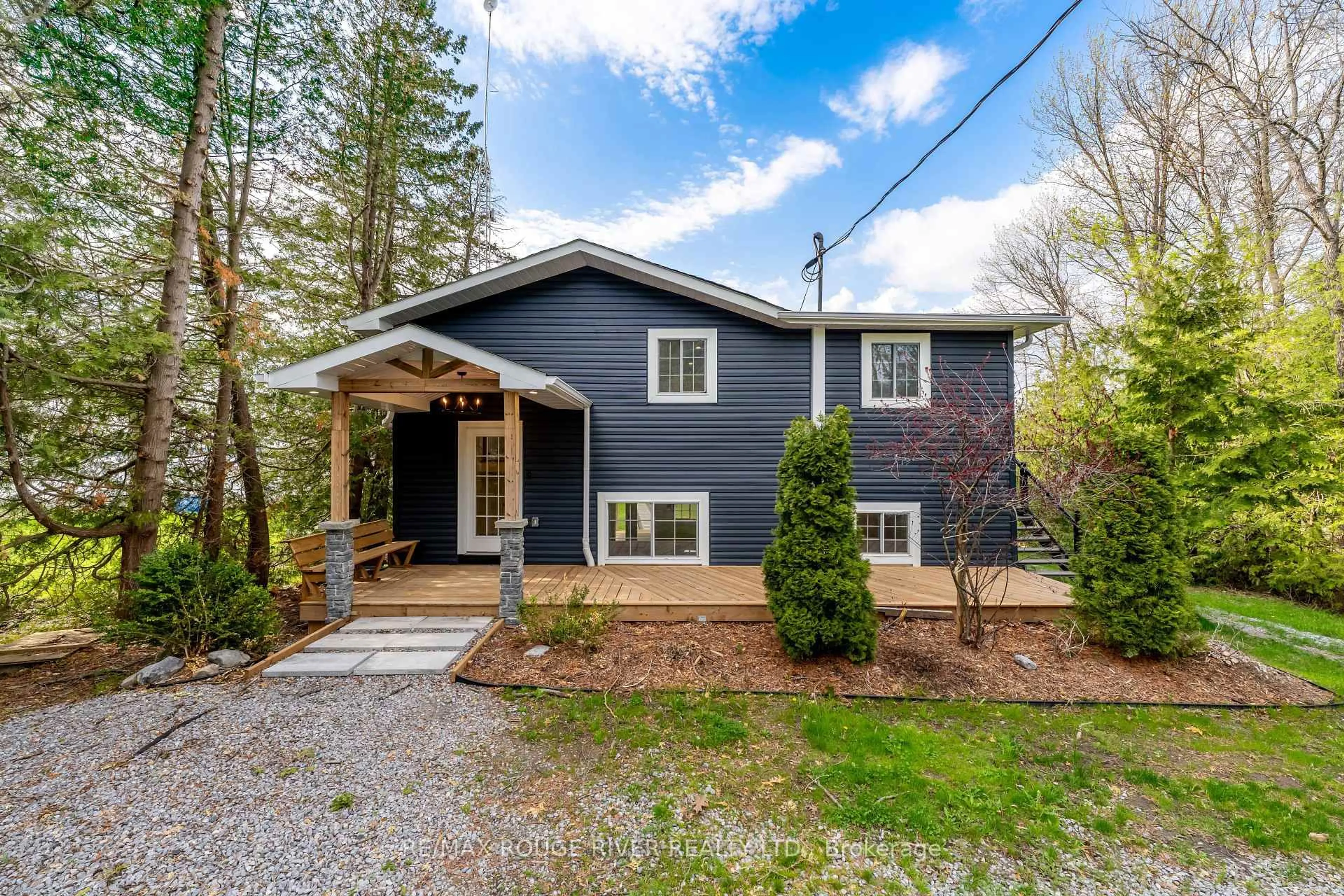 Home with vinyl exterior material, street for 5496 Rice Lake Scenic Dr #130, Hamilton Township Ontario K0K 2E0