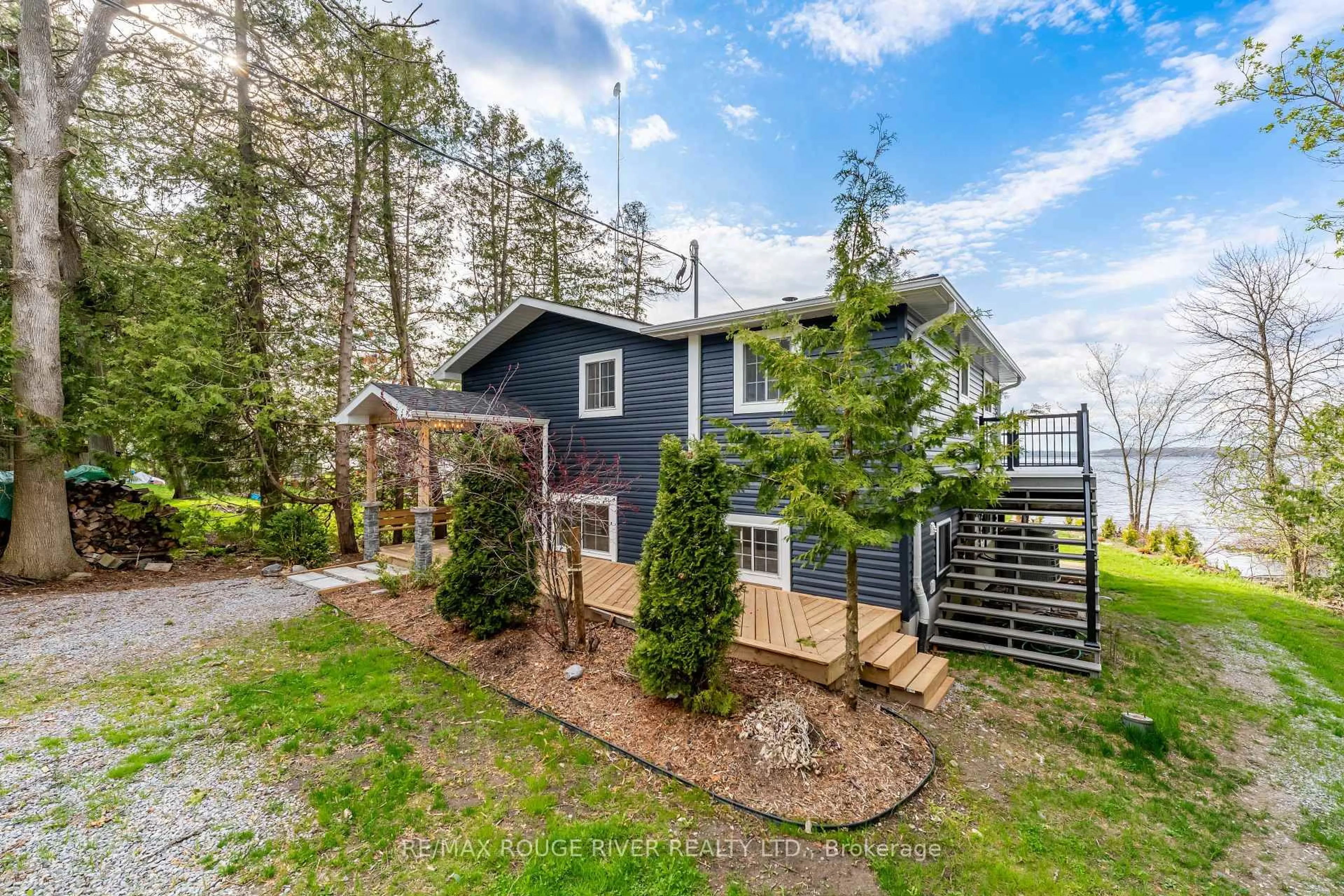 A pic from outside/outdoor area/front of a property/back of a property/a pic from drone, unknown for 5496 Rice Lake Scenic Dr #130, Hamilton Township Ontario K0K 2E0