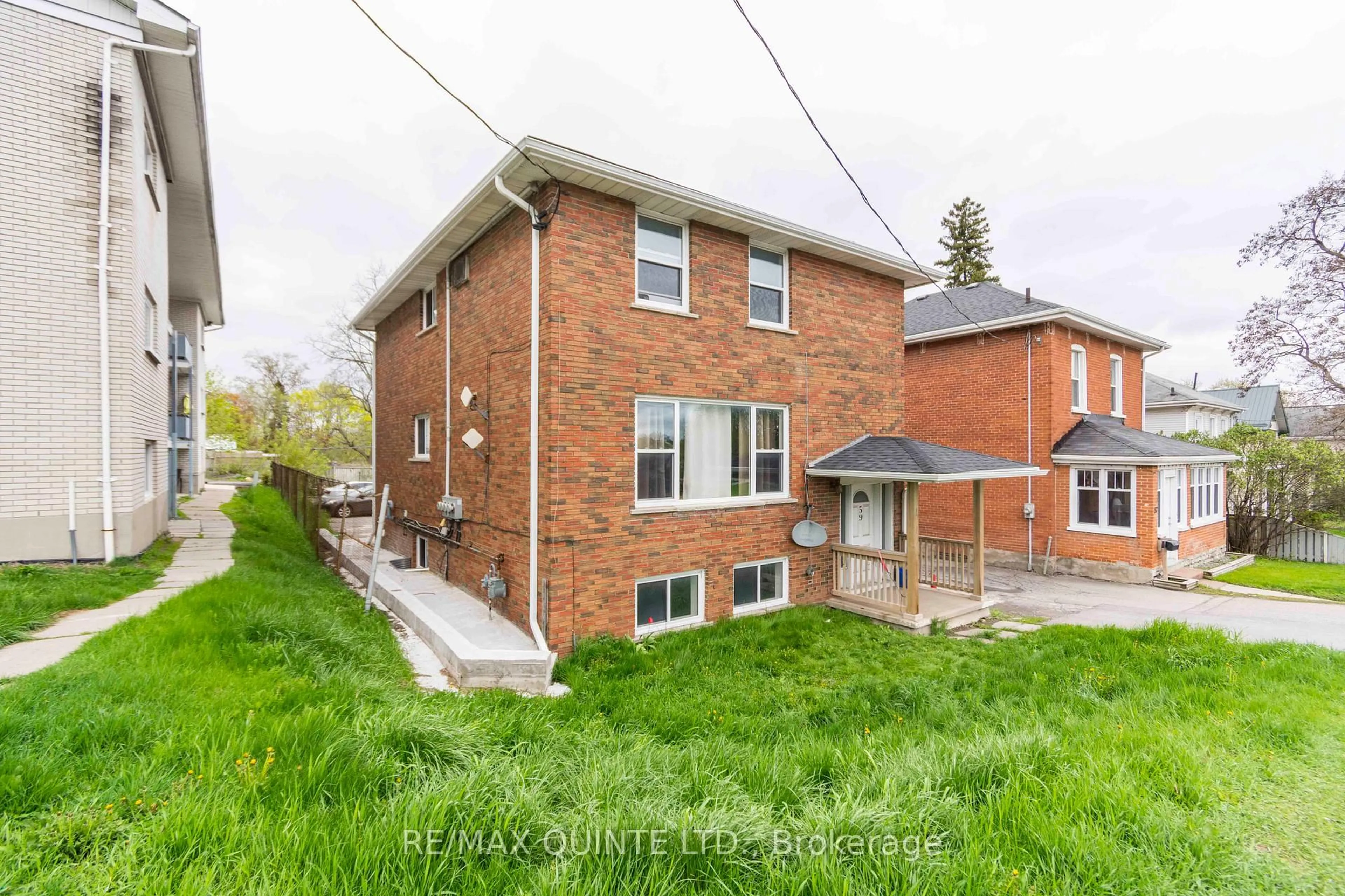 Home with brick exterior material, street for 59 North Front St, Belleville Ontario K8P 3B2