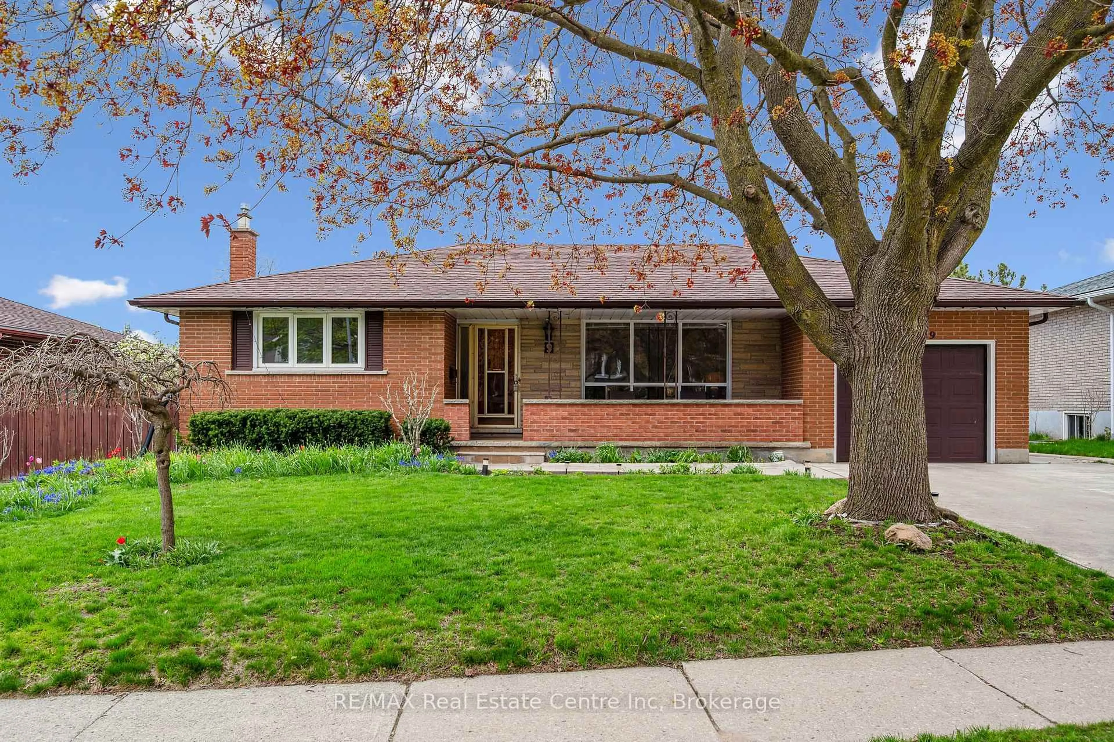 Home with brick exterior material, street for 9 Flanders Rd, Guelph Ontario N1G 1V8