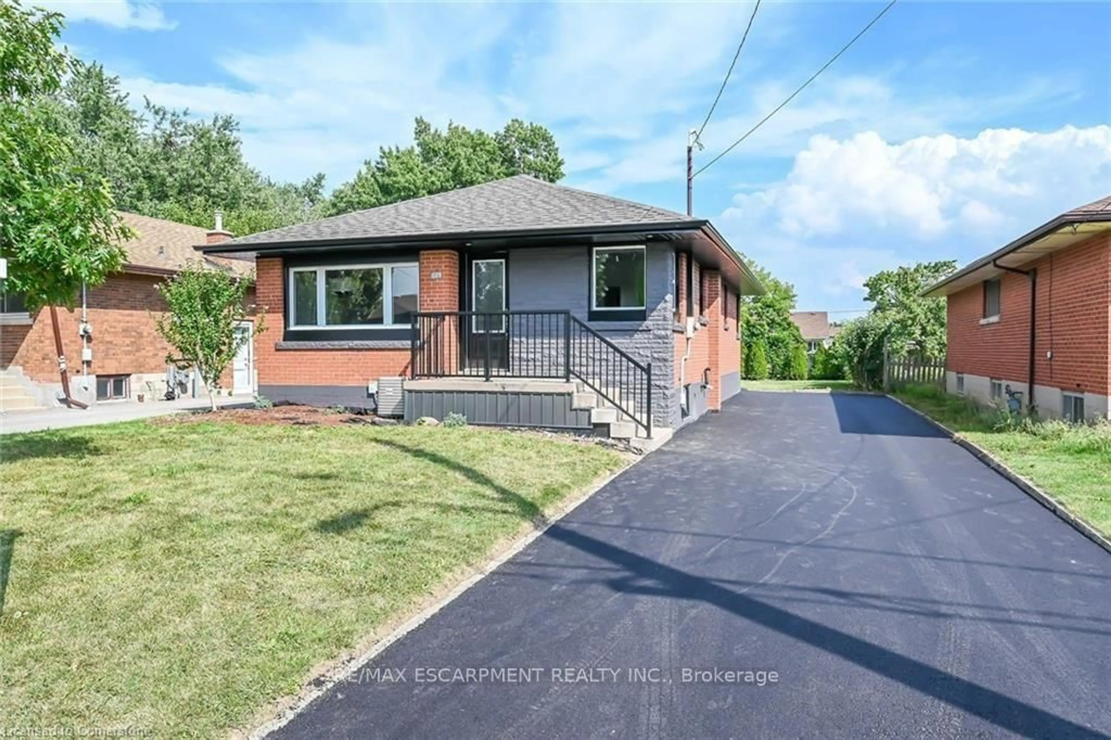 Home with brick exterior material, street for 379 East 19th St, Hamilton Ontario L9A 4S9