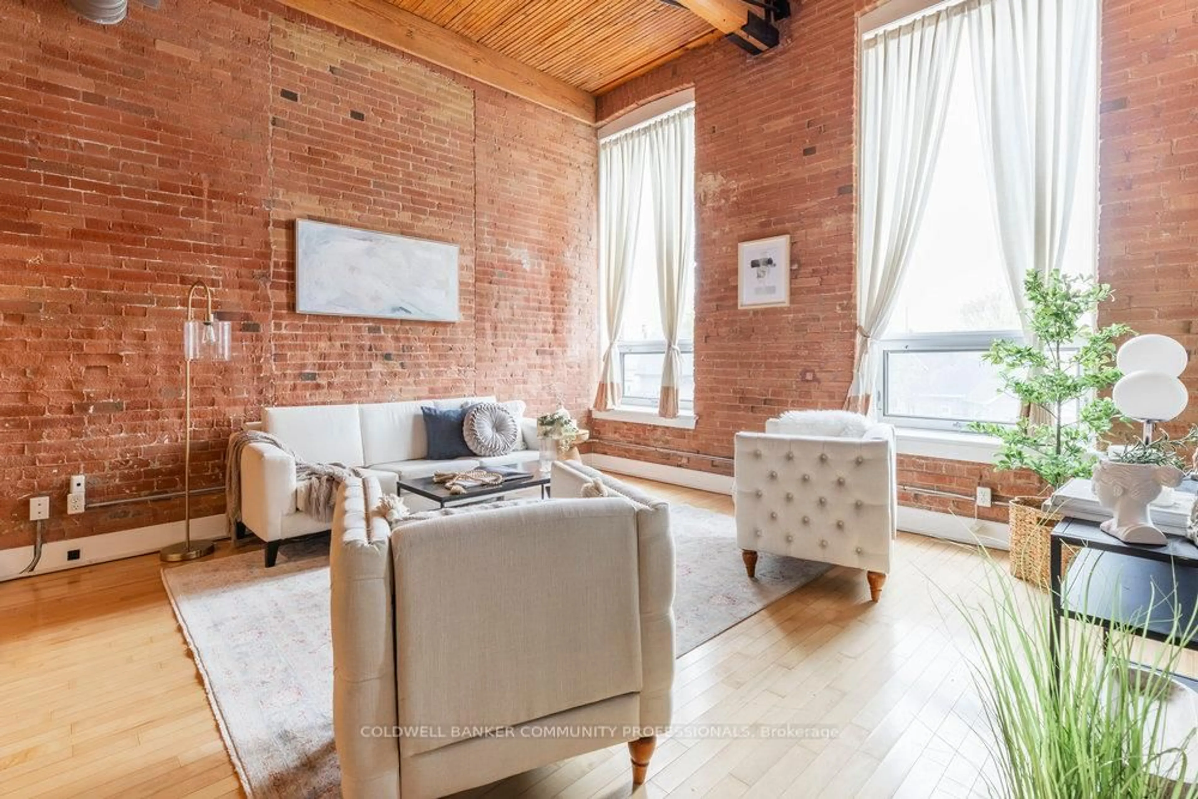 Living room with furniture, unknown for 26 Ontario St #216, Guelph Ontario N1E 7K1