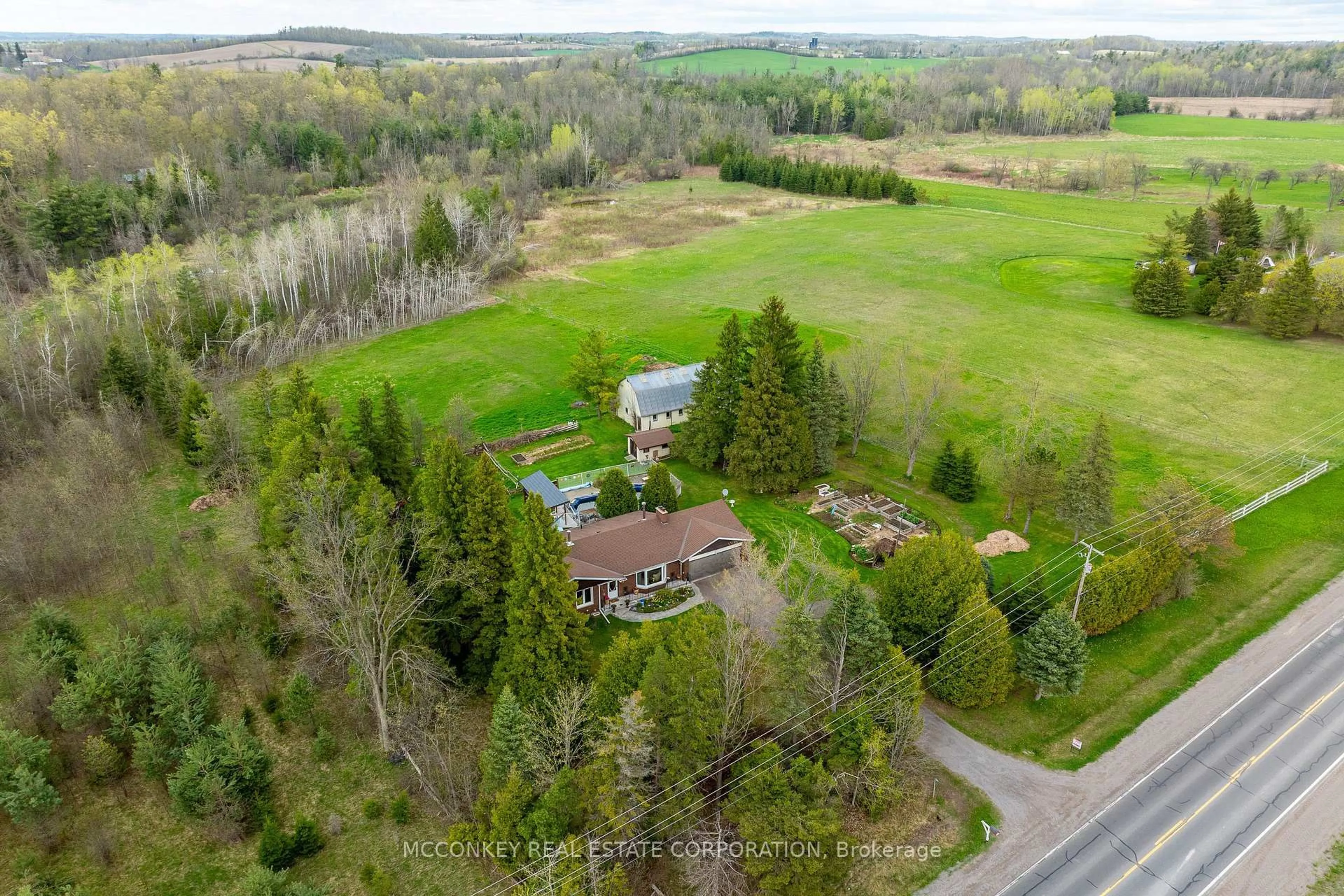 A pic from outside/outdoor area/front of a property/back of a property/a pic from drone, forest/trees view for 2170 COUNTY RD 2 N/A, Otonabee-South Monaghan Ontario K9J 6X7