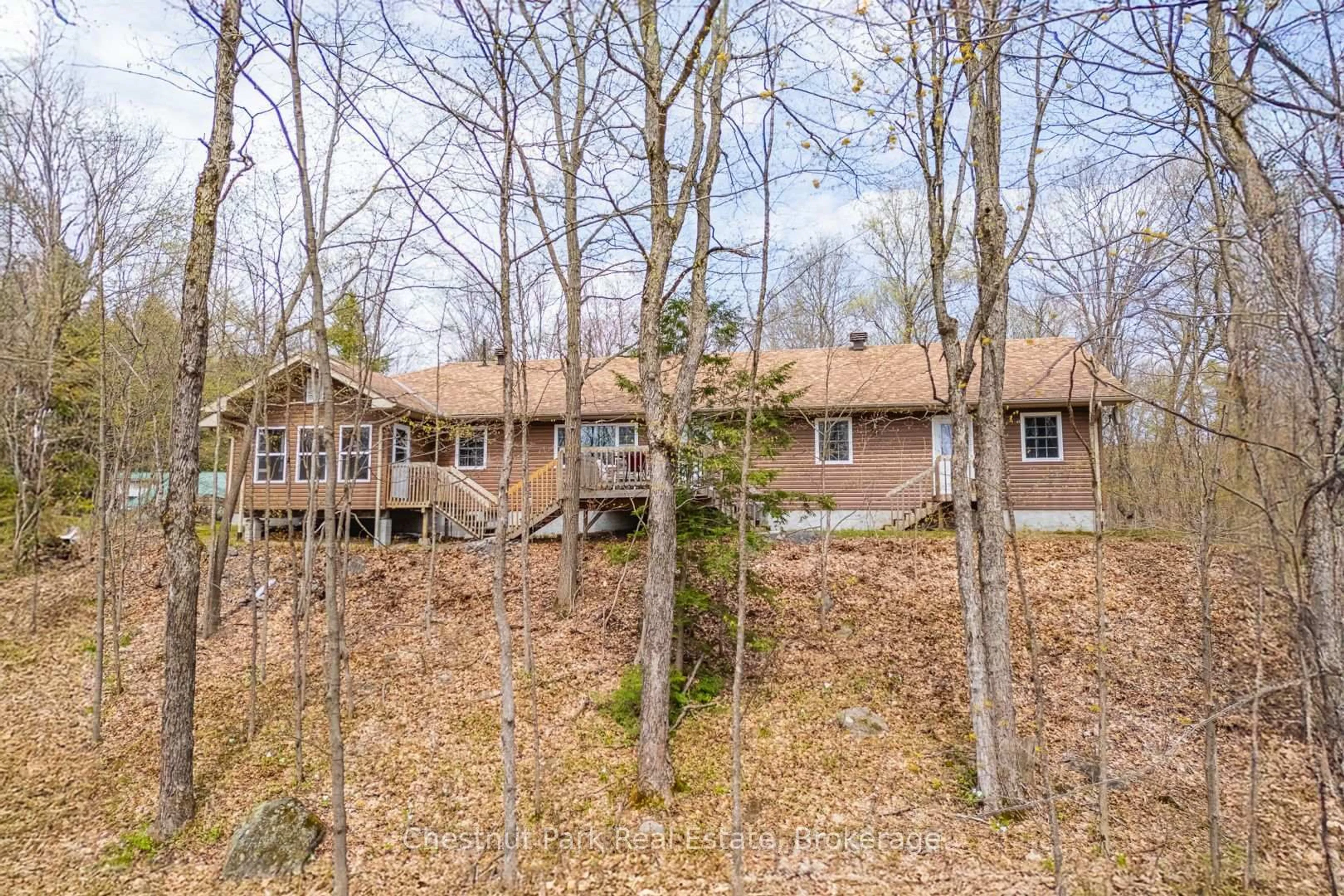 A pic from outside/outdoor area/front of a property/back of a property/a pic from drone, forest/trees view for 1255 Falkenburg Rd, Muskoka Lakes Ontario P1L 1X4