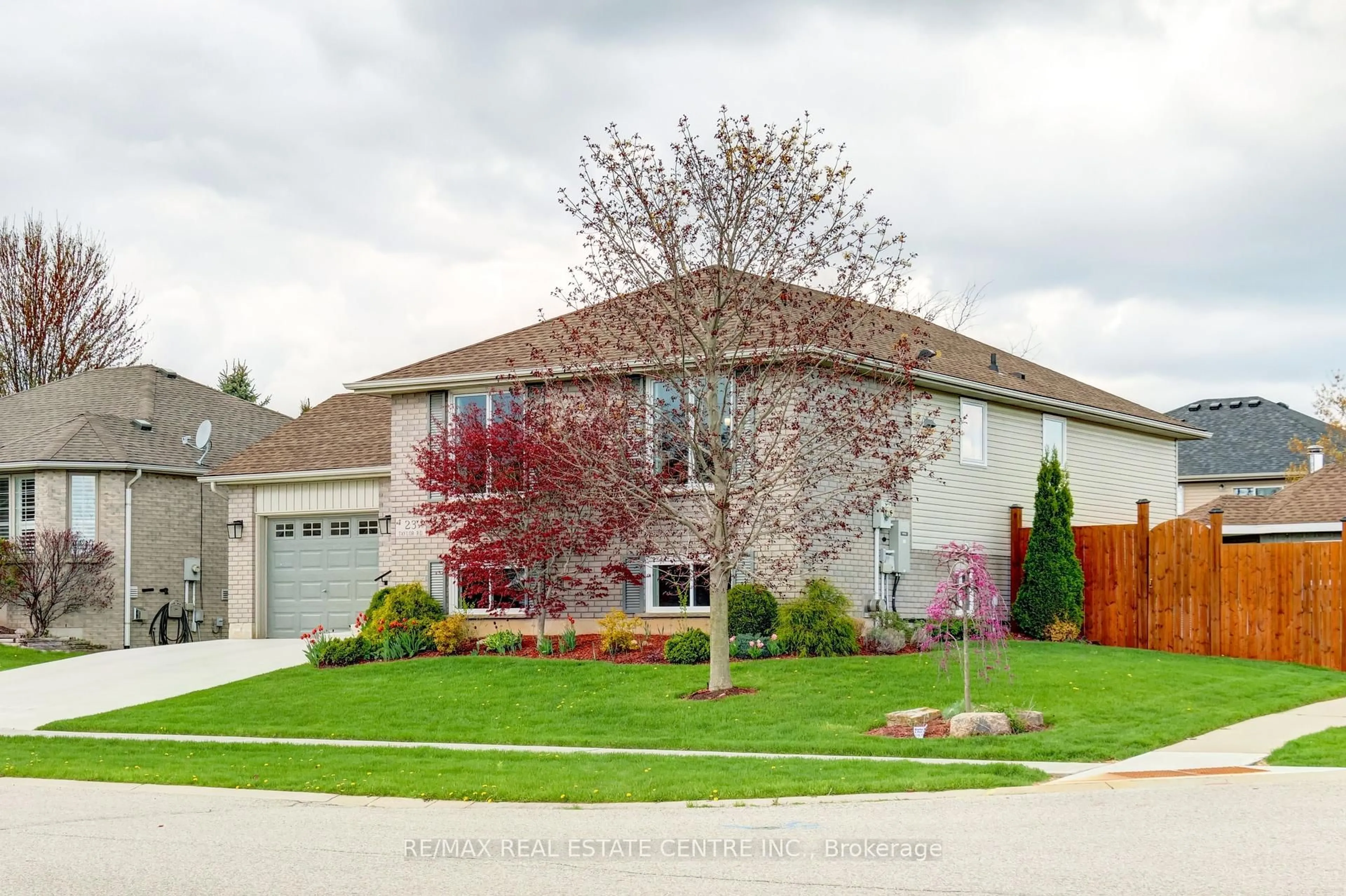 Home with vinyl exterior material, street for 23 Taylor Rd, Brant Ontario N0E 1N0
