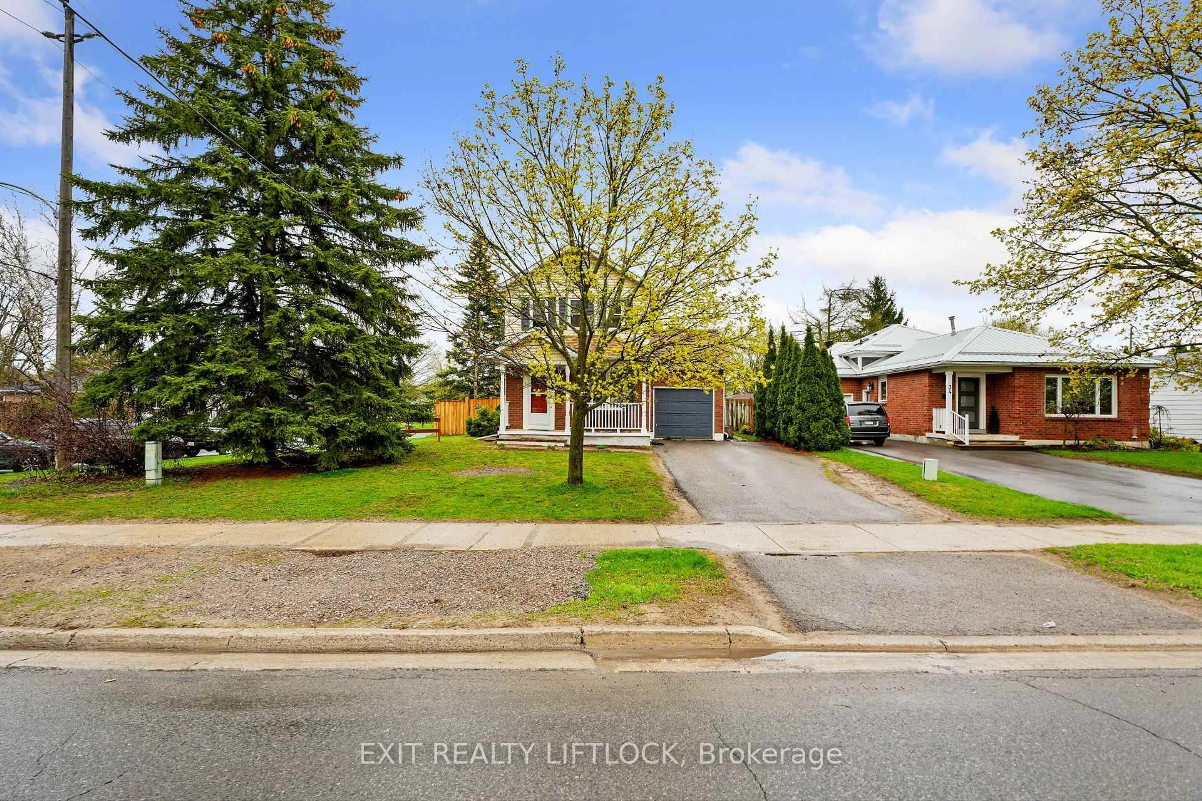 A pic from outside/outdoor area/front of a property/back of a property/a pic from drone, street for 36 Kawartha Heights Blvd, Peterborough West Ontario K9J 8B3