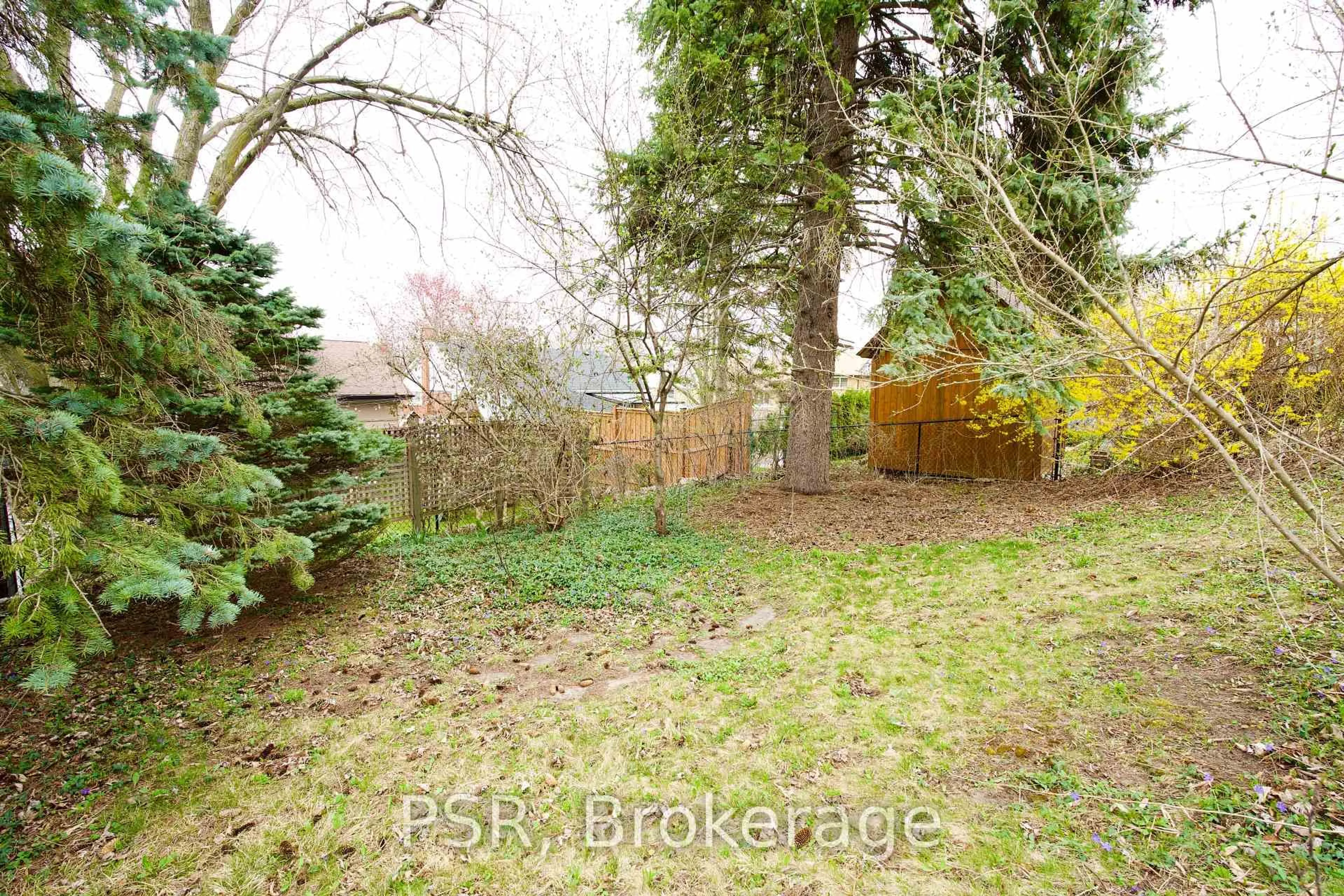 A pic from outside/outdoor area/front of a property/back of a property/a pic from drone, forest/trees view for 176 Rodney St, Waterloo Ontario N2J 1G3