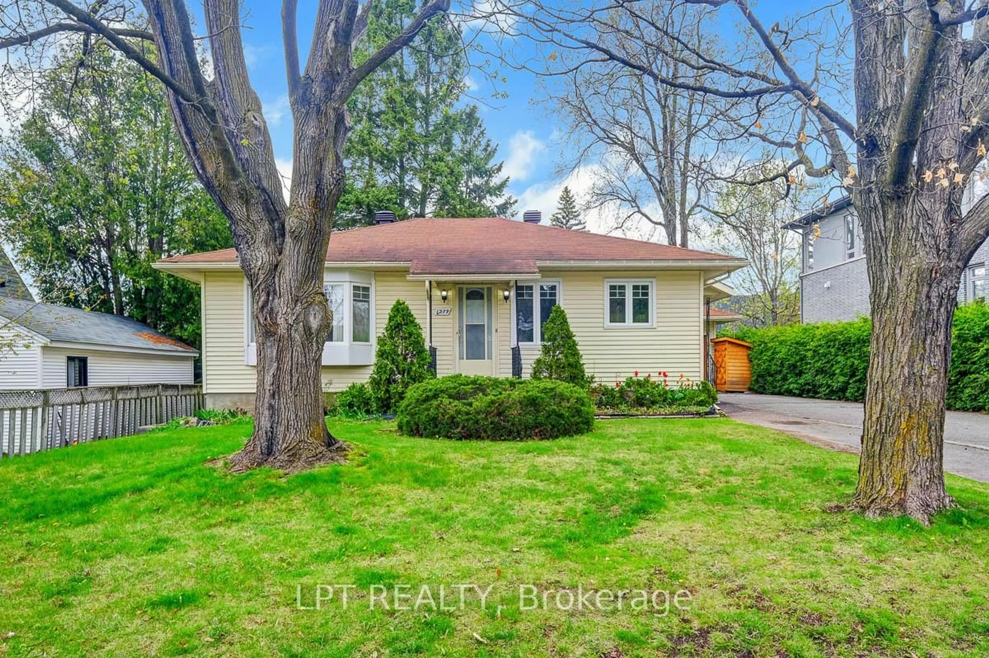 Home with vinyl exterior material, street for 1279 Livingstone Ave, Ottawa Ontario K1H 7P7