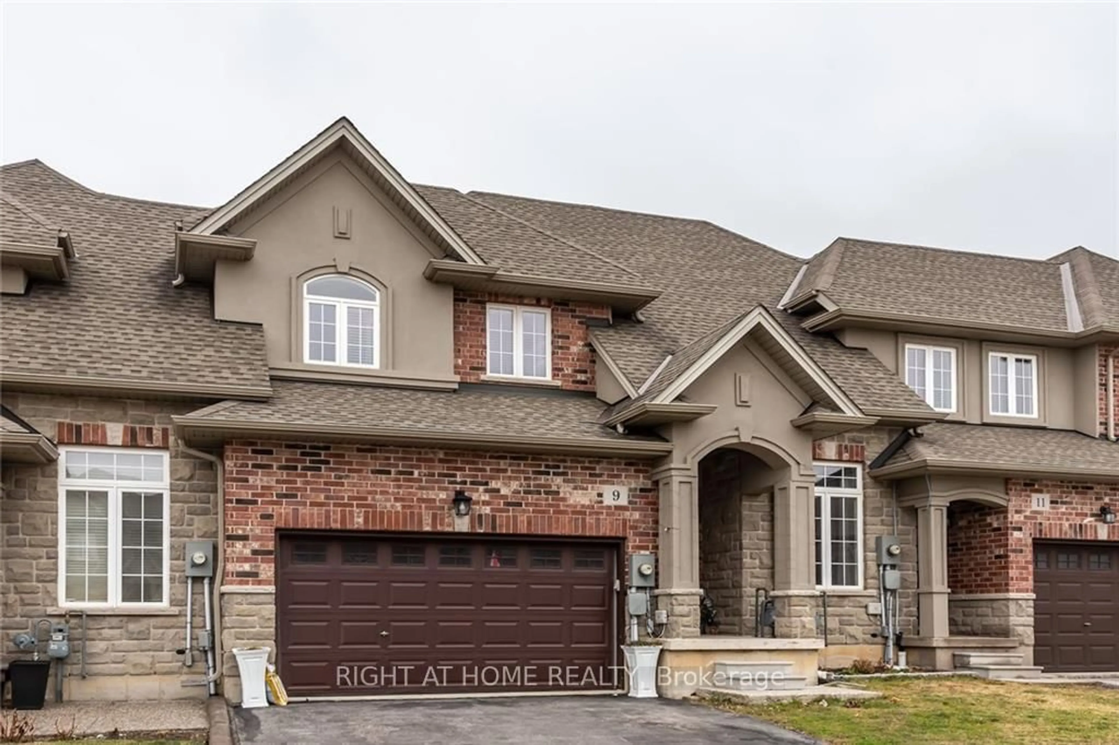 Home with brick exterior material, street for 9 Medici Lane, Hamilton Ontario L9B 0C8