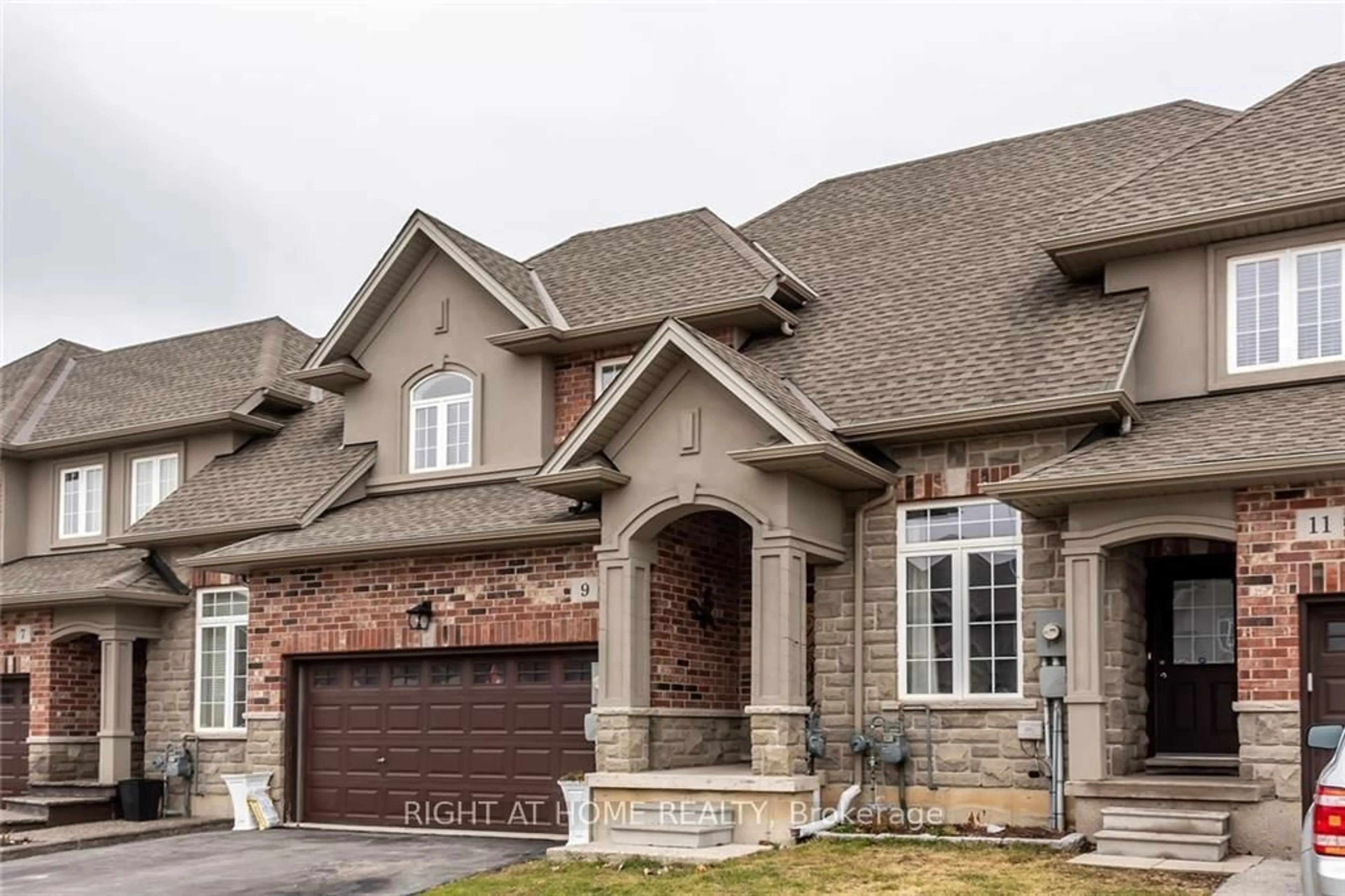 Home with brick exterior material, street for 9 Medici Lane, Hamilton Ontario L9B 0C8