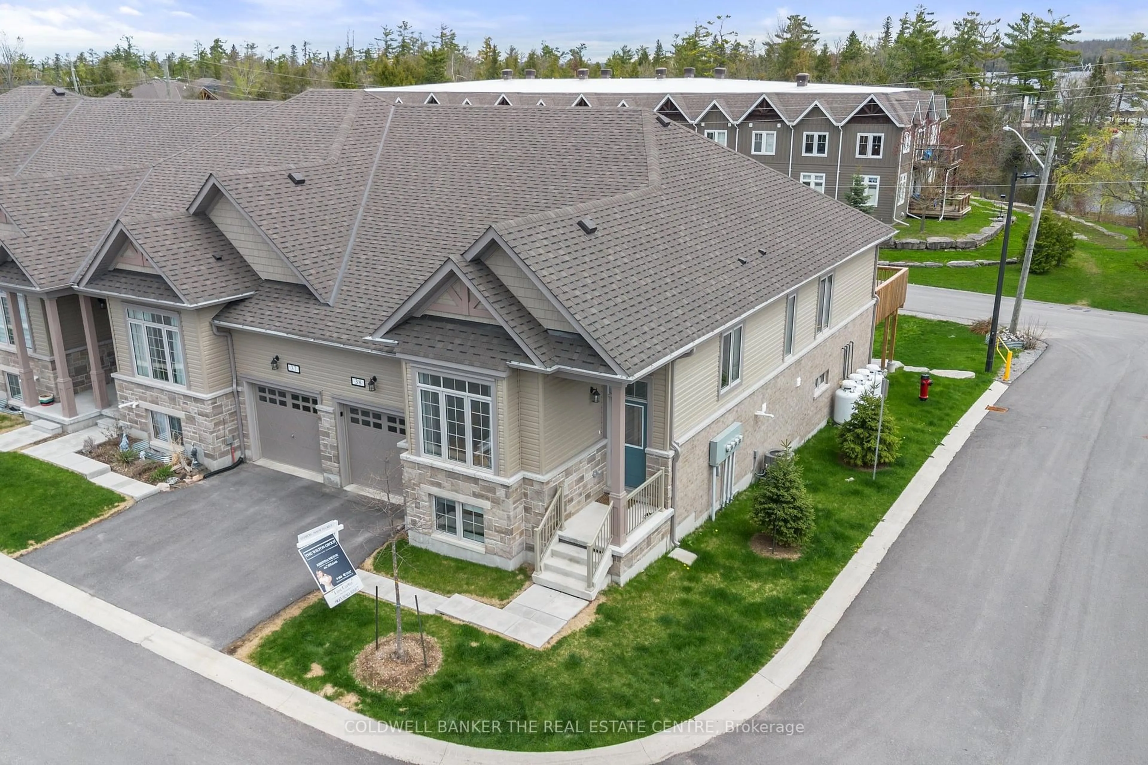 A pic from outside/outdoor area/front of a property/back of a property/a pic from drone, mountain view for 17 Lakewood Cres #38, Kawartha Lakes Ontario K0M 1A0