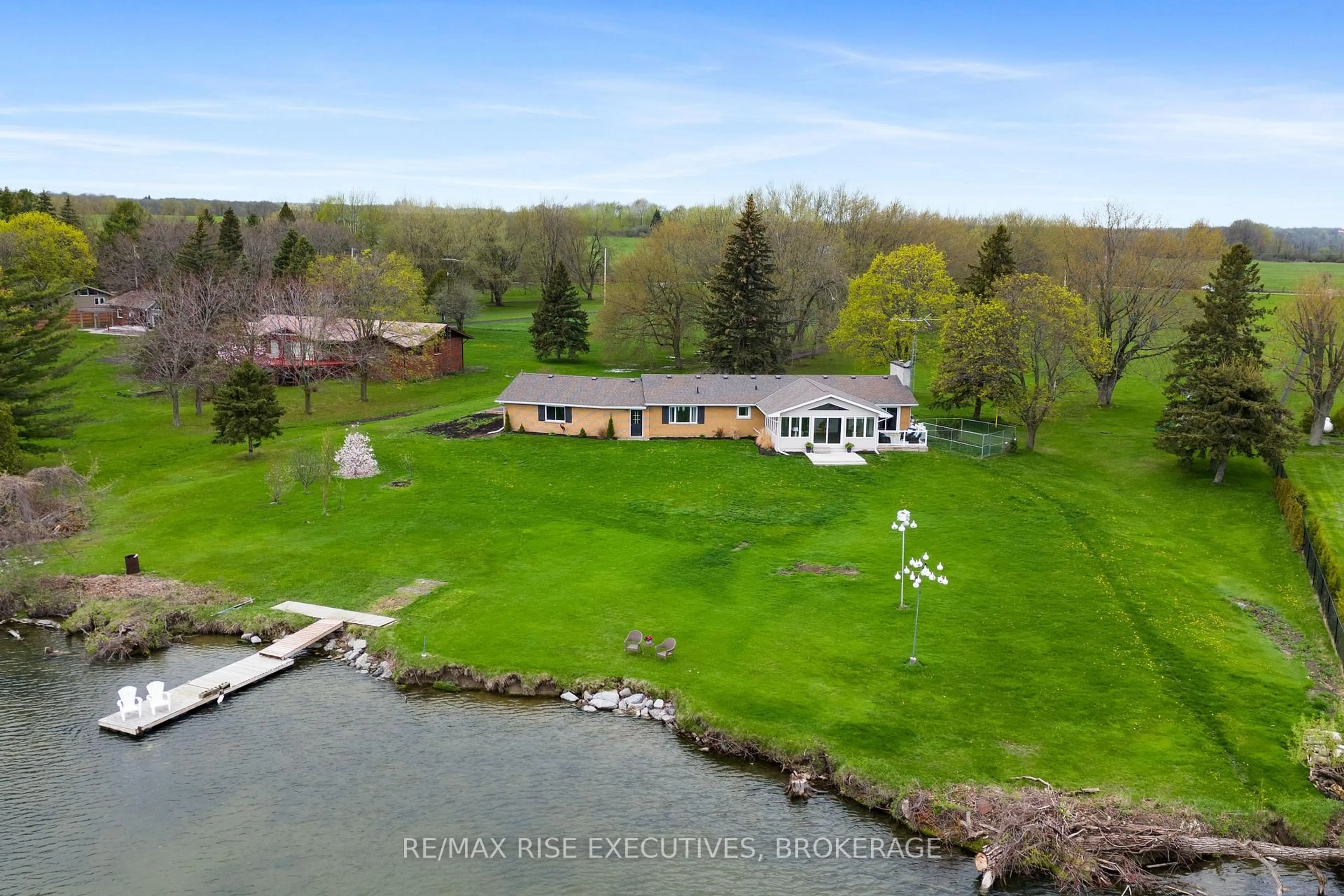 A pic from outside/outdoor area/front of a property/back of a property/a pic from drone, water/lake/river/ocean view for 25 Aragon Rd, Kingston Ontario K0H 1S0