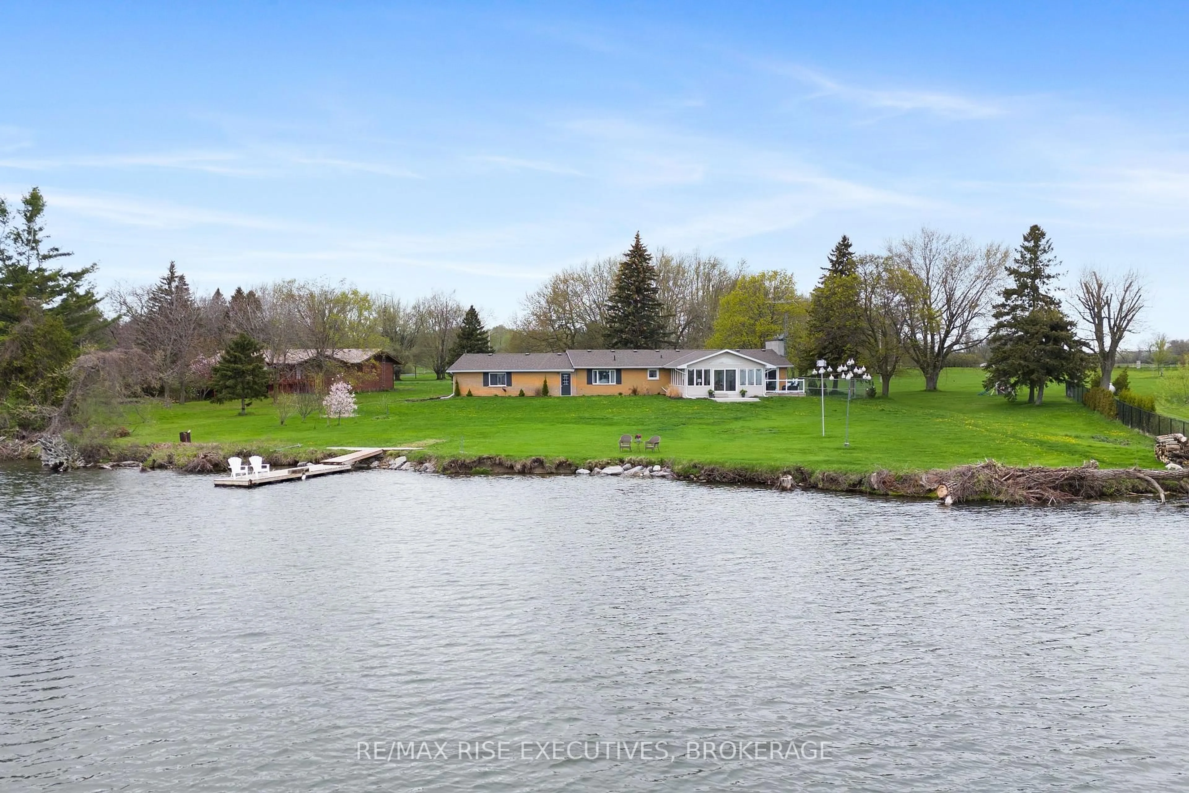 A pic from outside/outdoor area/front of a property/back of a property/a pic from drone, water/lake/river/ocean view for 25 Aragon Rd, Kingston Ontario K0H 1S0