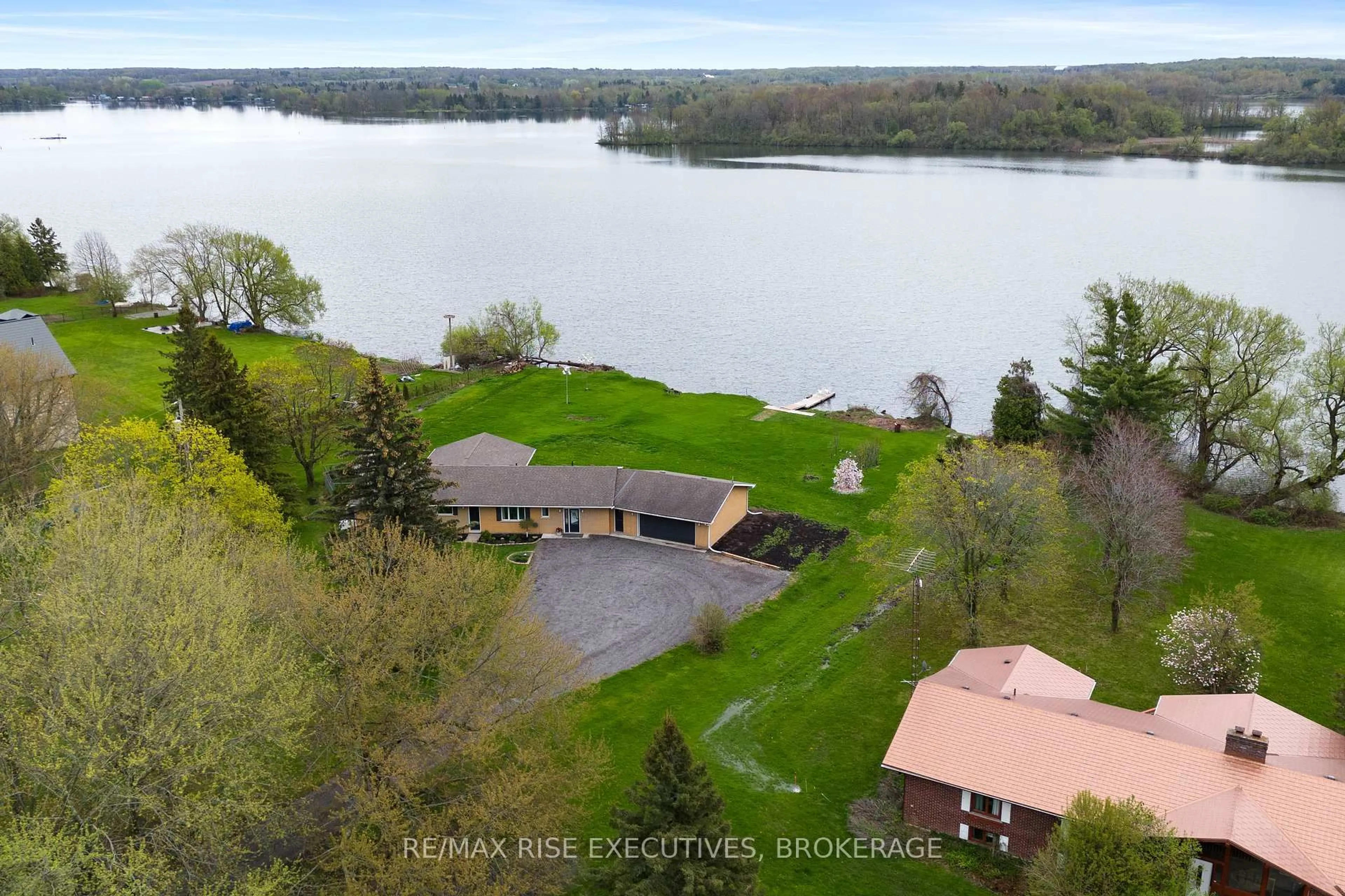 A pic from outside/outdoor area/front of a property/back of a property/a pic from drone, water/lake/river/ocean view for 25 Aragon Rd, Kingston Ontario K0H 1S0