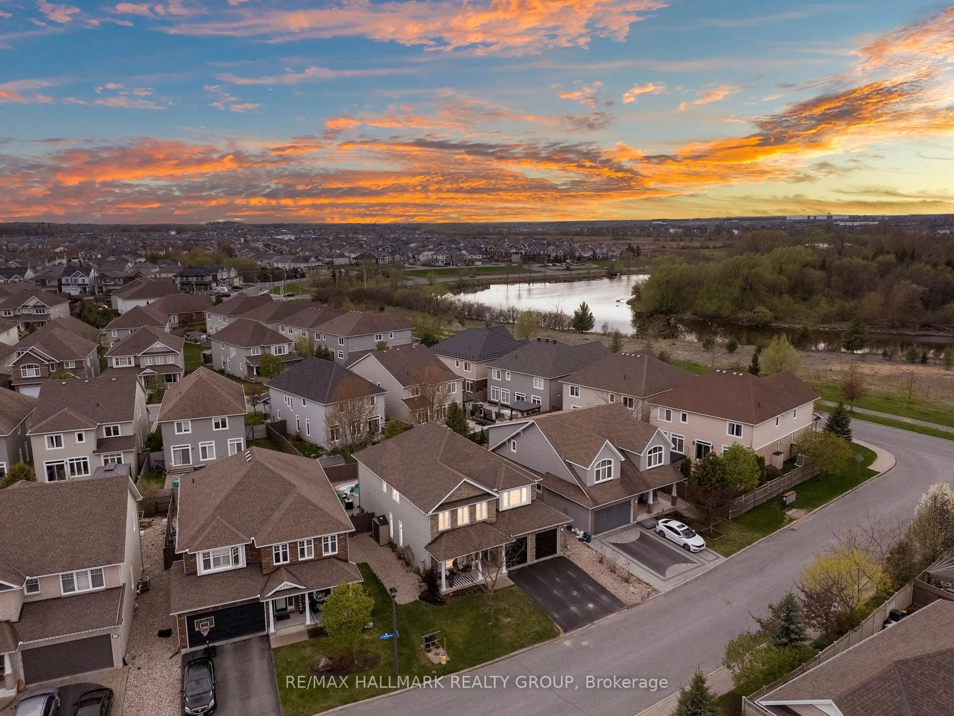 A pic from outside/outdoor area/front of a property/back of a property/a pic from drone, water/lake/river/ocean view for 412 Callisto Way, Ottawa Ontario K2J 0Z3