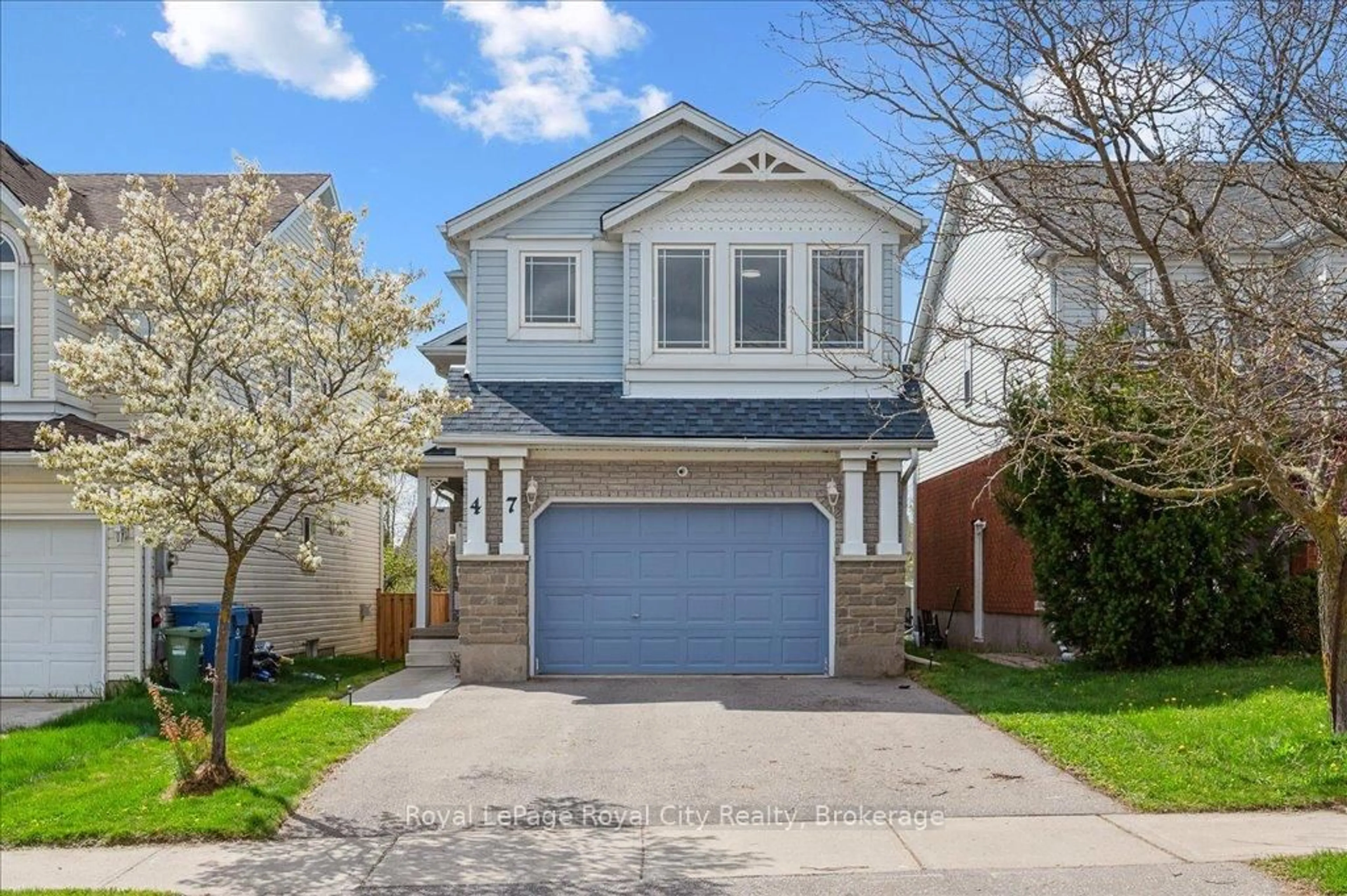 Home with vinyl exterior material, street for 47 McCurdy Rd, Guelph Ontario N1G 4Z9