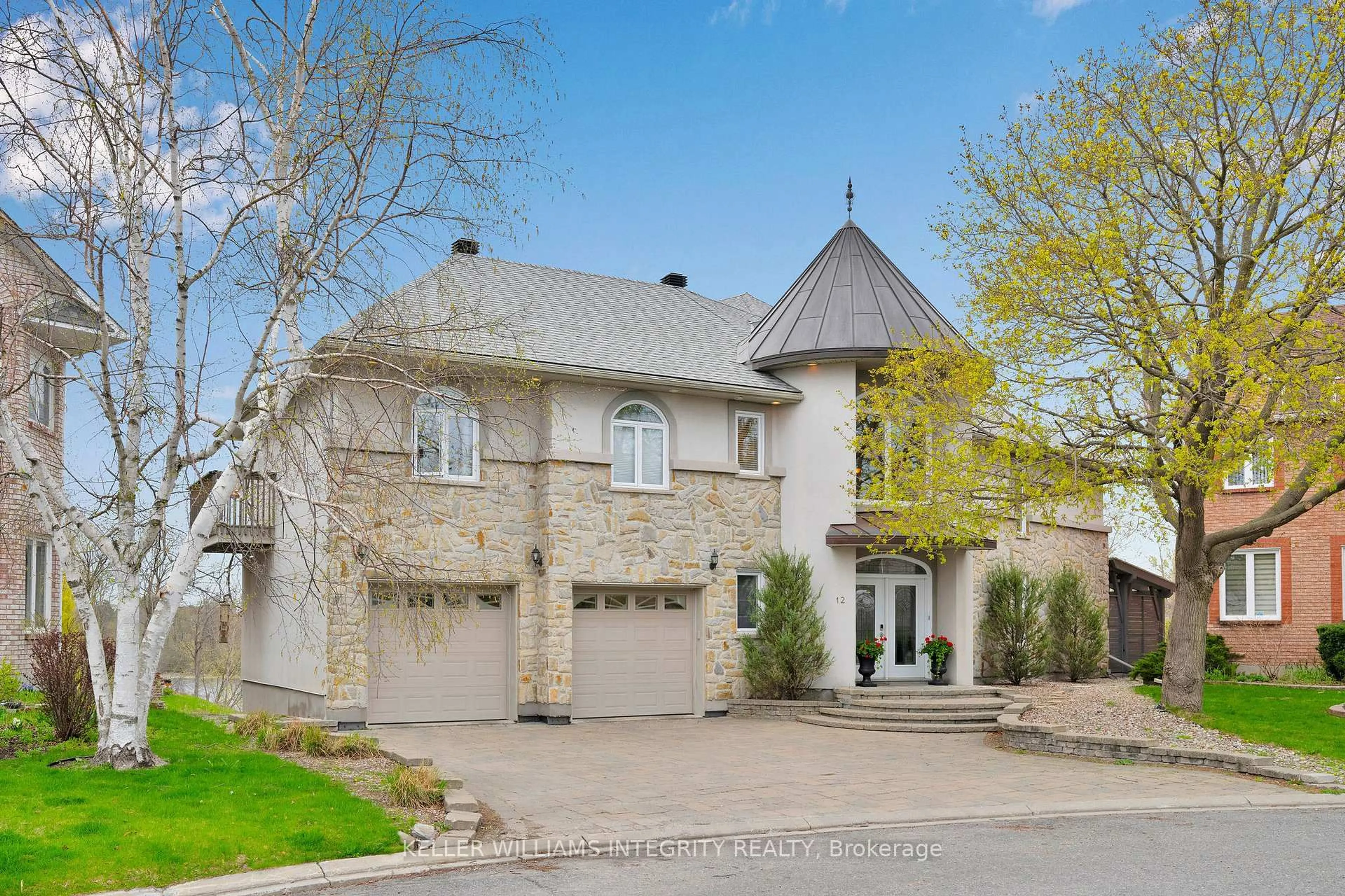 Home with brick exterior material, street for 12 Rideau Shore Crt, Ottawa Ontario K2C 3Y8