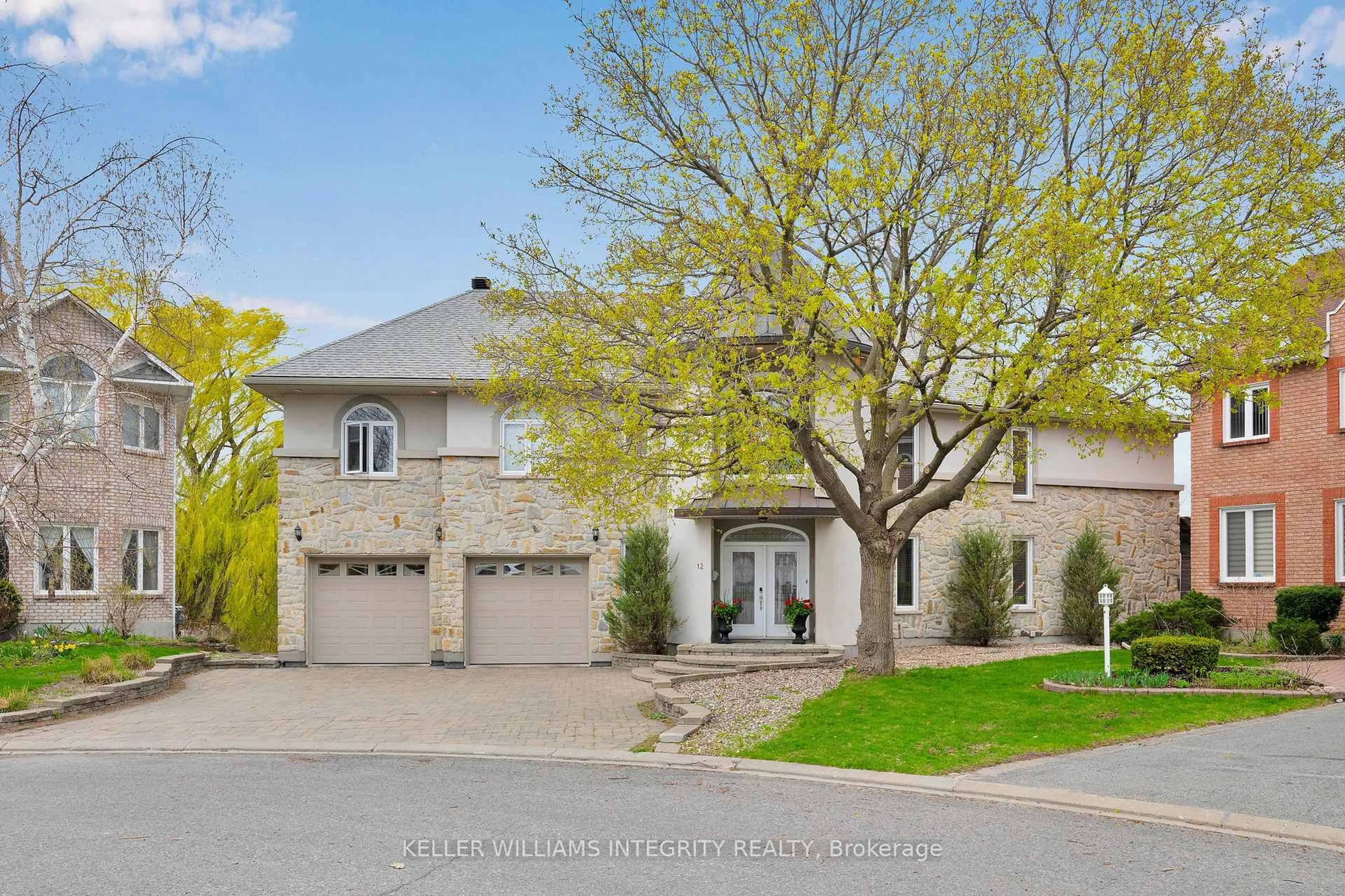 Home with brick exterior material, street for 12 Rideau Shore Crt, Ottawa Ontario K2C 3Y8