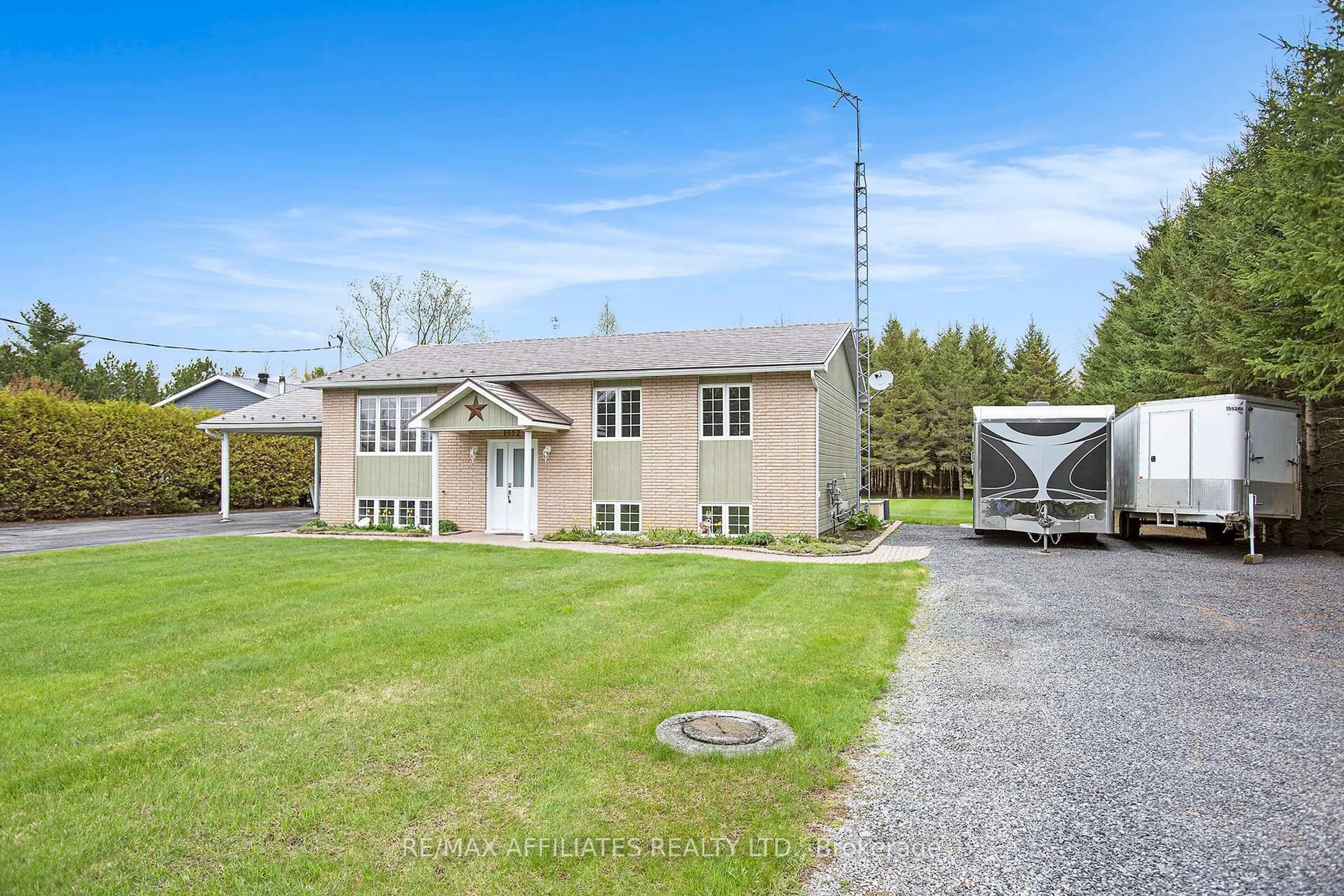 A pic from outside/outdoor area/front of a property/back of a property/a pic from drone, street for 1092 Montee Benoit Sdrd, The Nation Ontario K0A 1M0