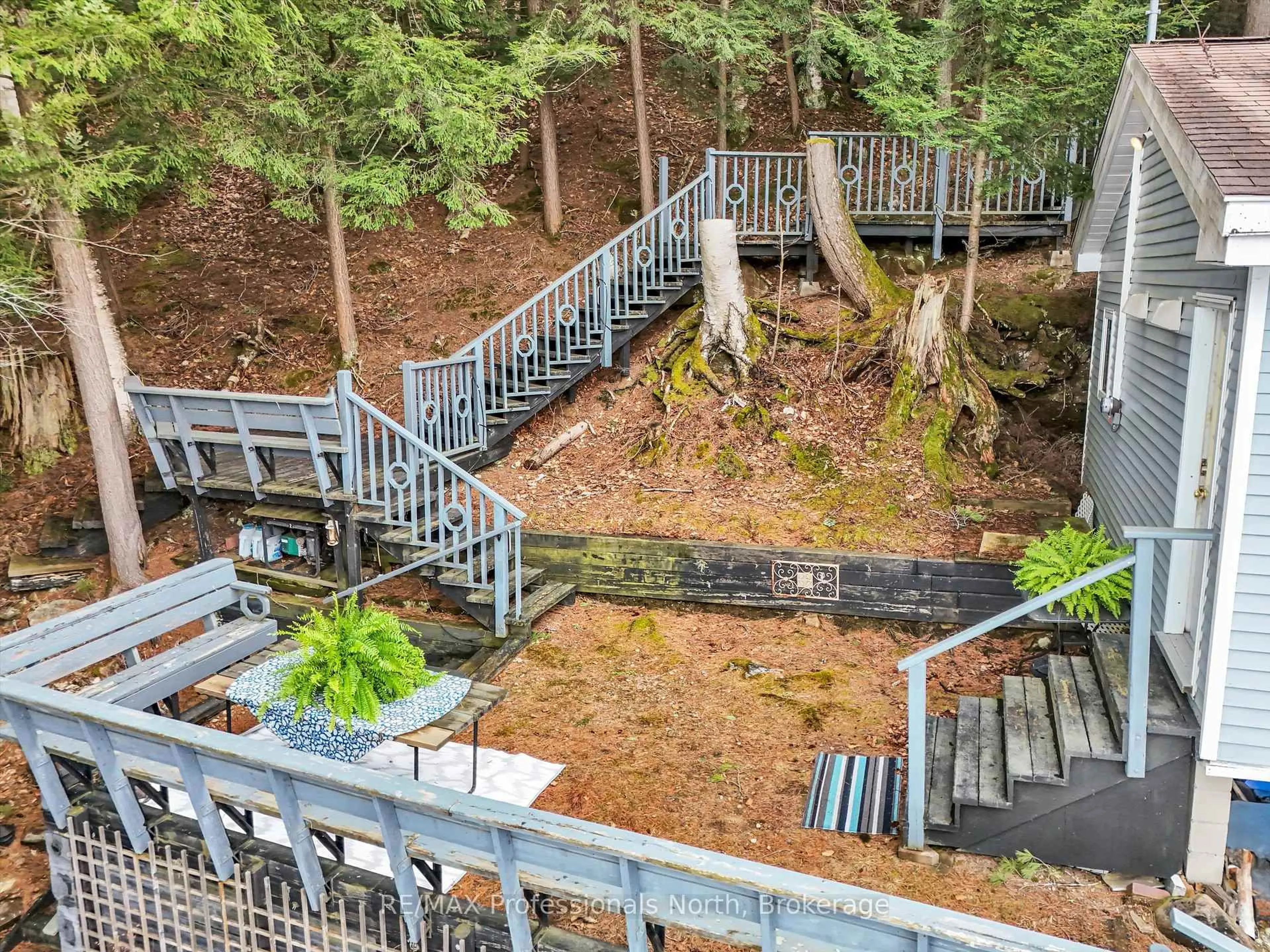 A pic from outside/outdoor area/front of a property/back of a property/a pic from drone, forest/trees view for 1014 Twilight Close Crt, Algonquin Highlands Ontario P0A 1E0