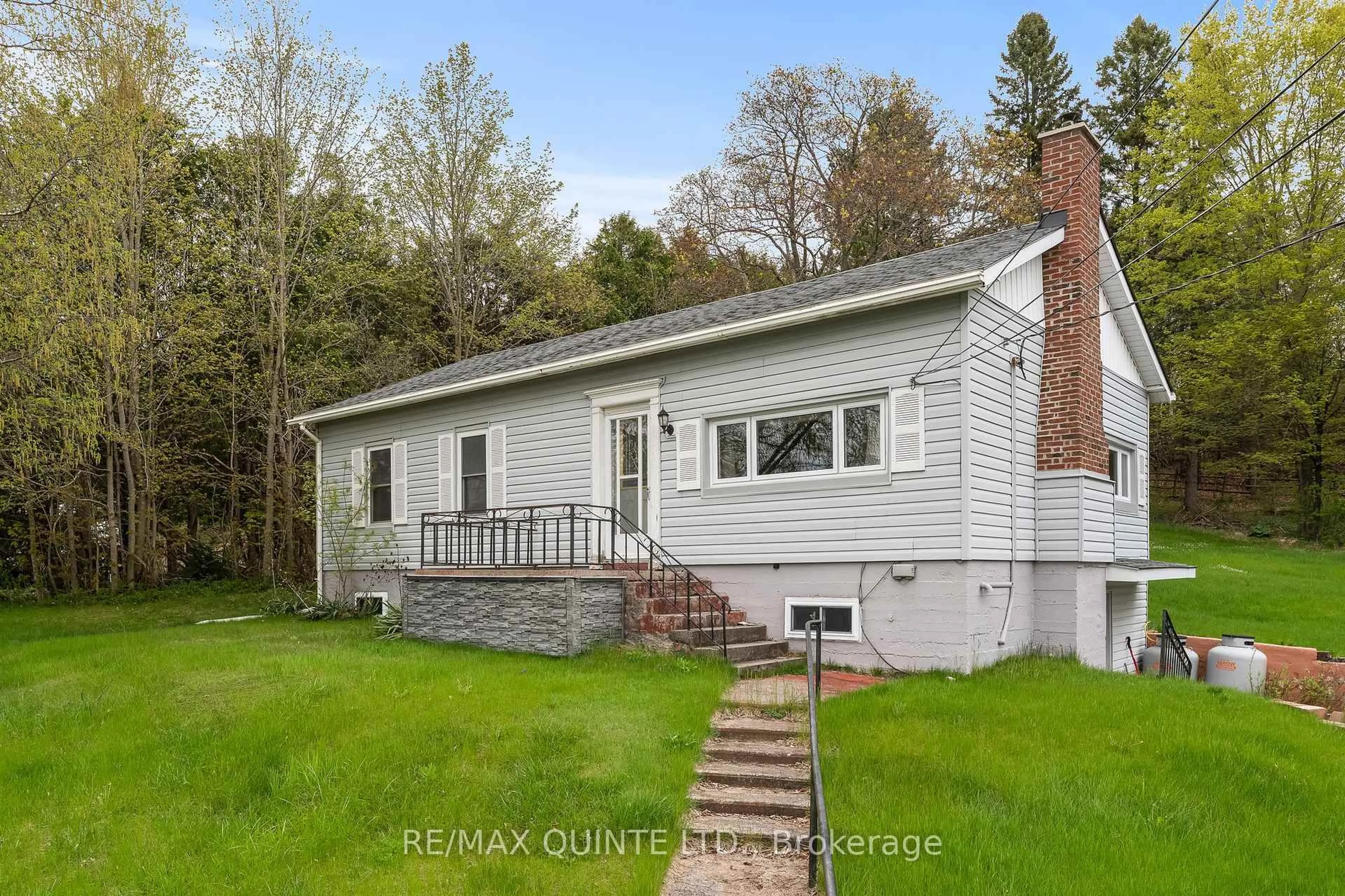 Home with vinyl exterior material, street for 35 George St, Brighton Ontario K0K 1H0