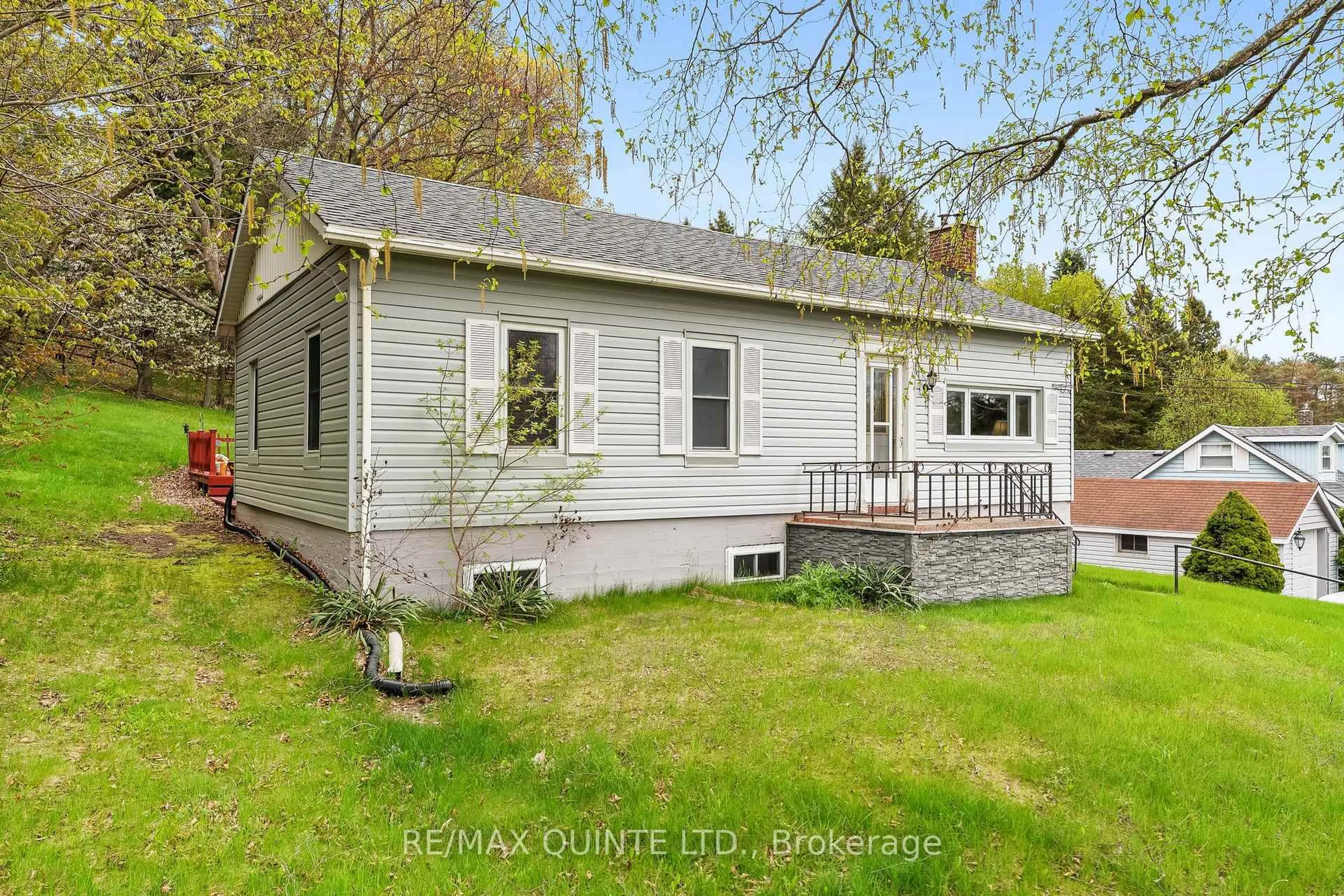 Home with vinyl exterior material, street for 35 George St, Brighton Ontario K0K 1H0
