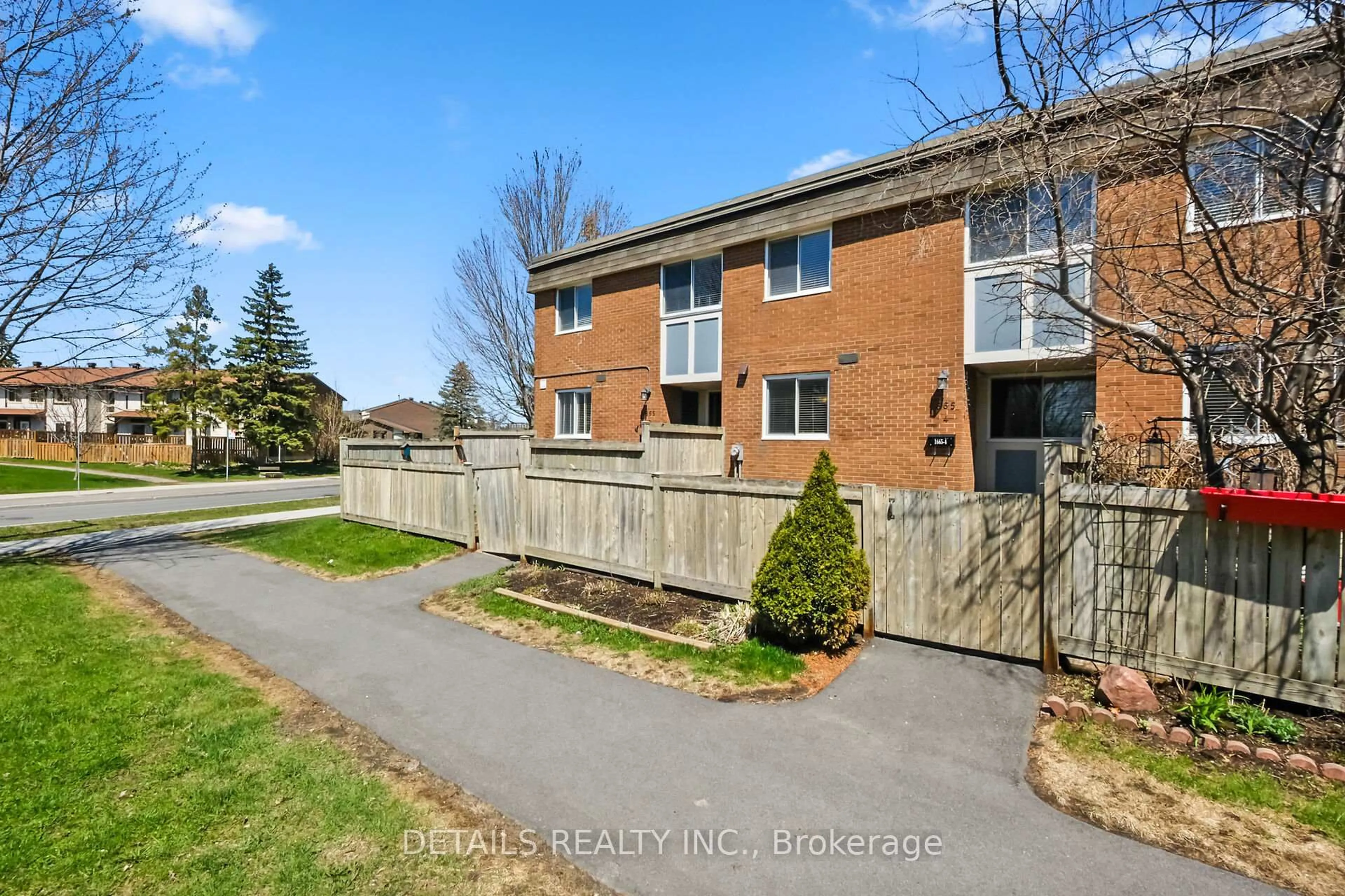 A pic from outside/outdoor area/front of a property/back of a property/a pic from drone, street for 1665 Heatherington Rd #4, Ottawa Ontario K1V 8V8
