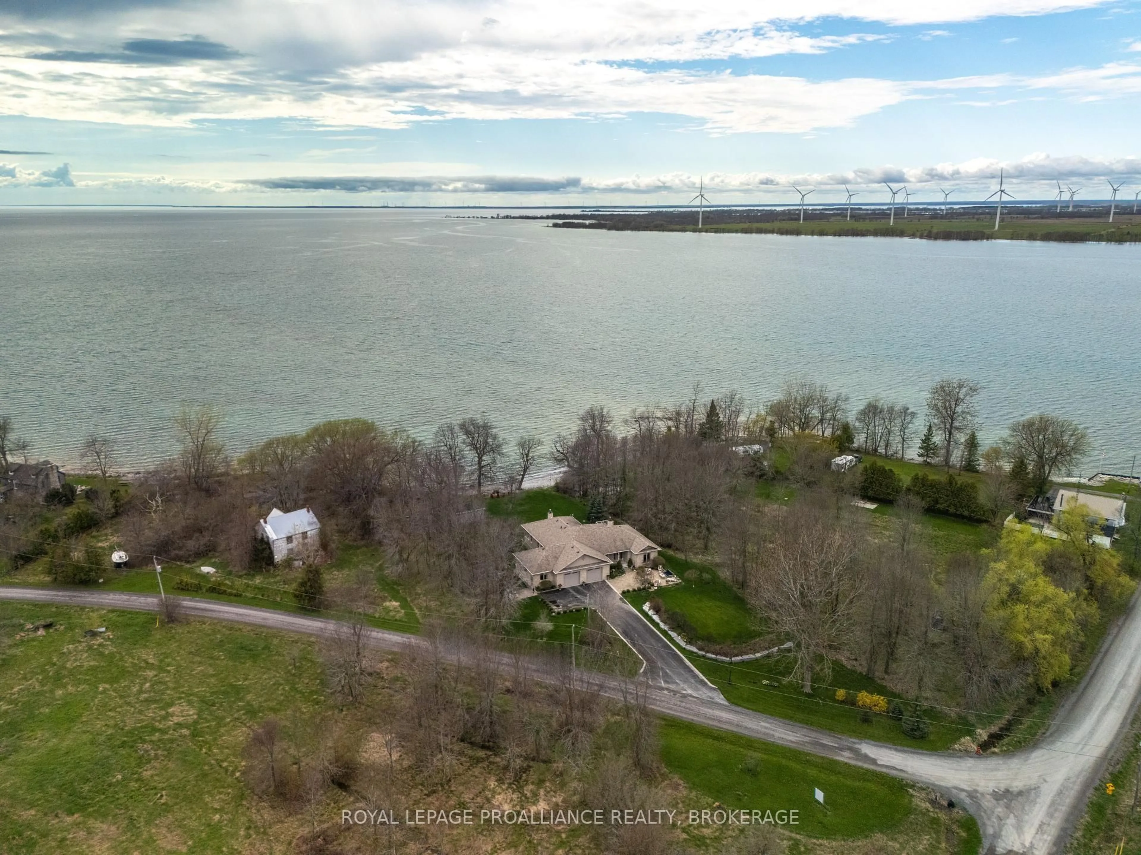 A pic from outside/outdoor area/front of a property/back of a property/a pic from drone, water/lake/river/ocean view for 12 Easy Lane, Wolfe Island Ontario K0H 2Y0