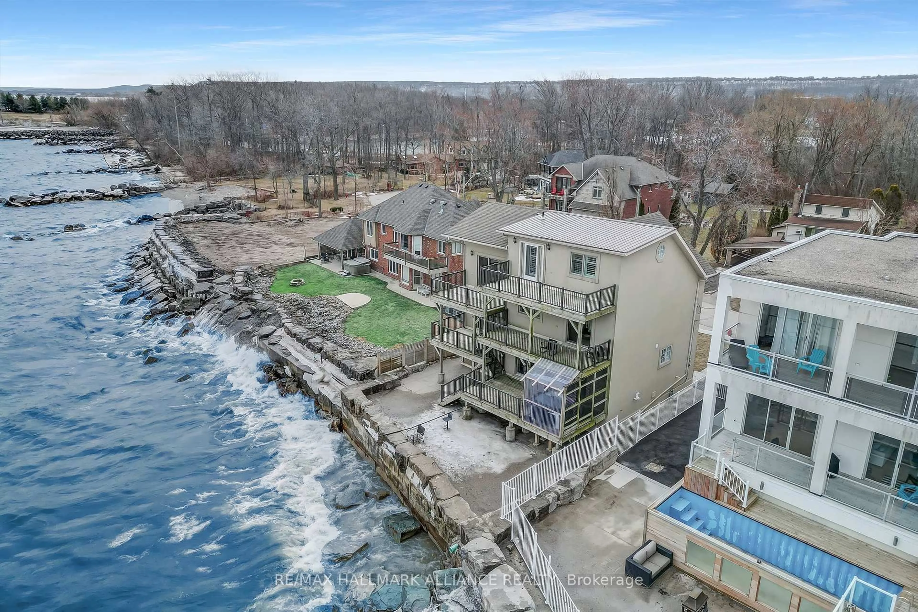 A pic from outside/outdoor area/front of a property/back of a property/a pic from drone, water/lake/river/ocean view for 53 Windemere Rd, Hamilton Ontario L8E 5G5