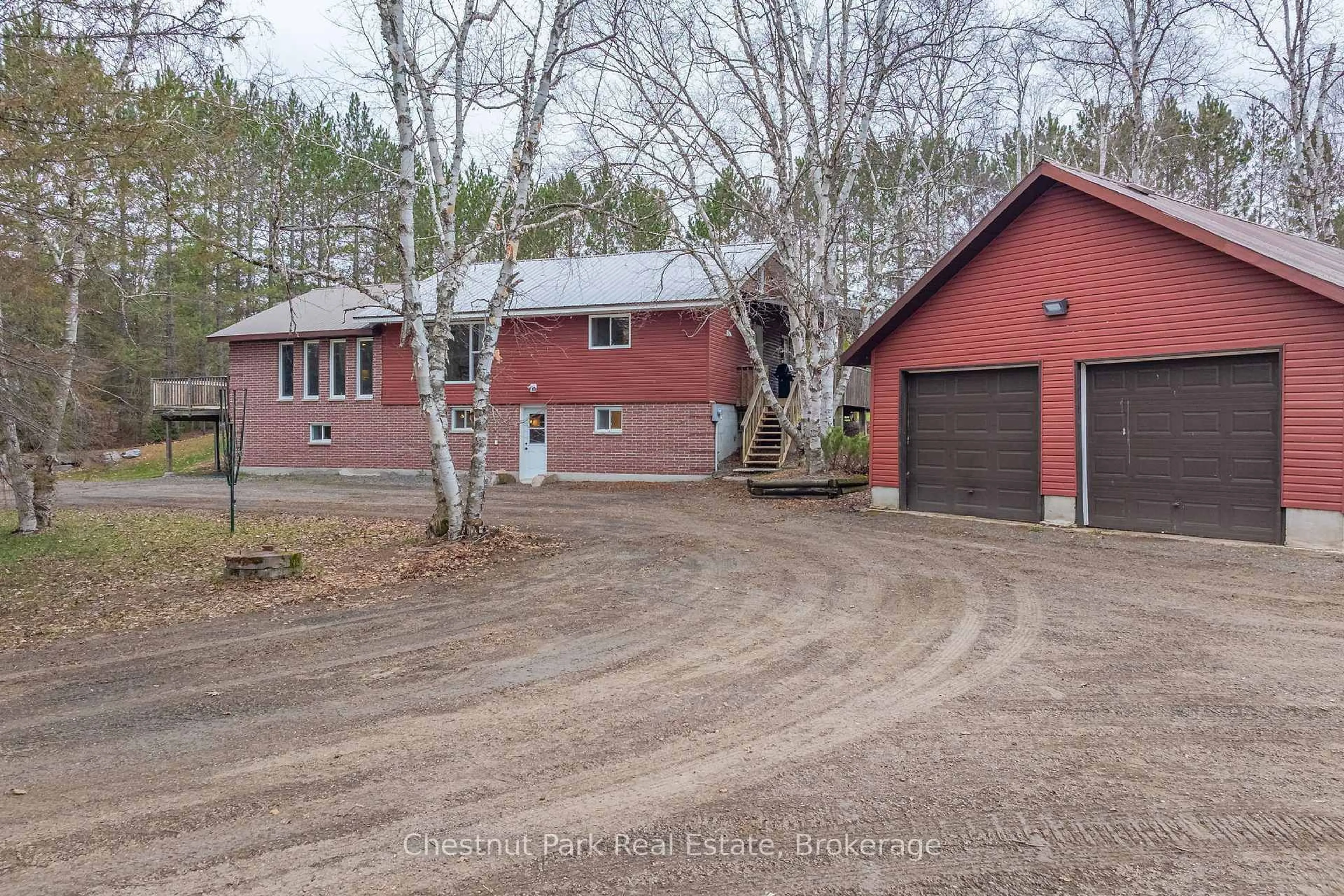 A pic from outside/outdoor area/front of a property/back of a property/a pic from drone, street for 316 Goreville Rd, Machar Ontario P0A 1X0