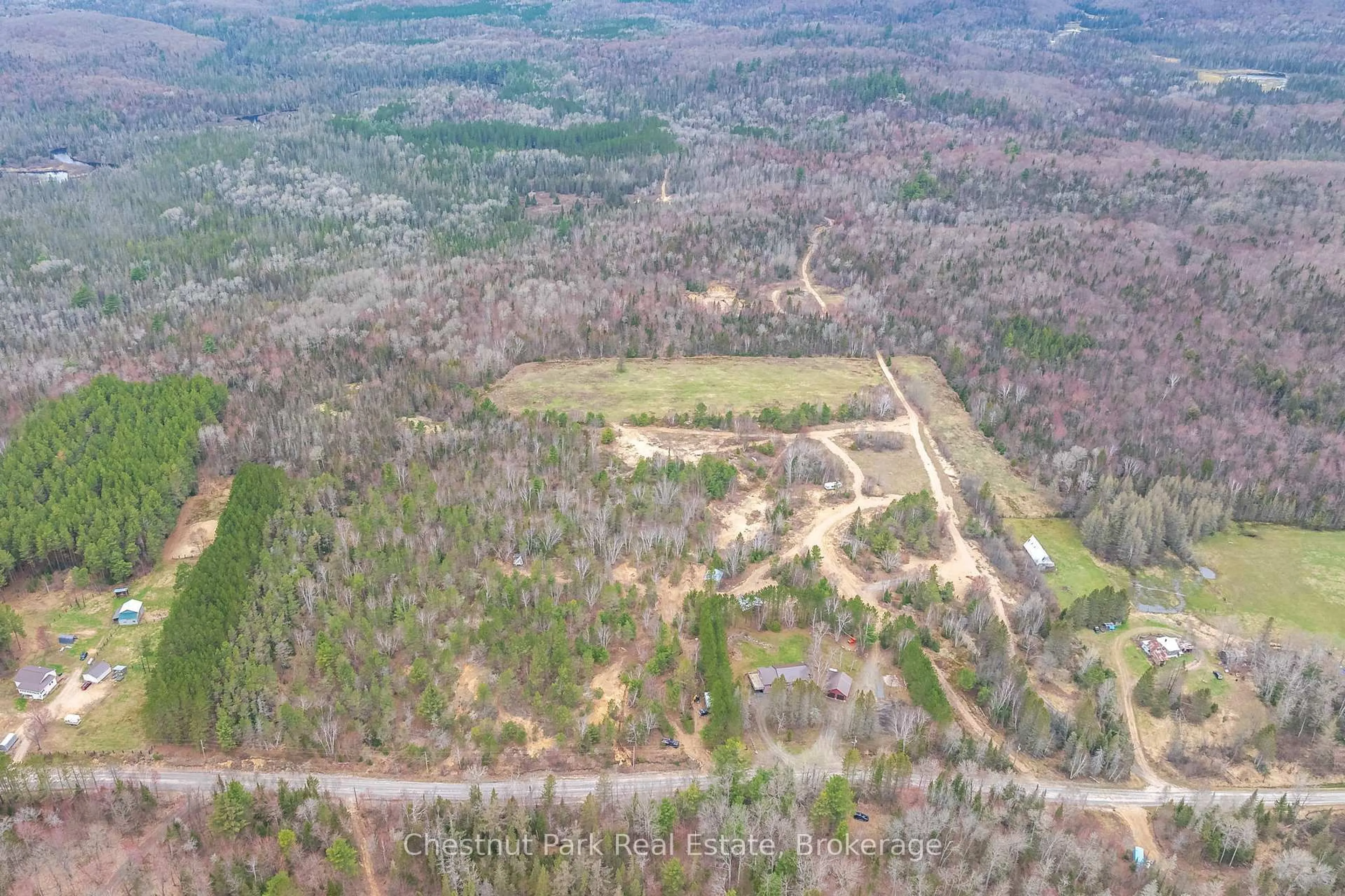 A pic from outside/outdoor area/front of a property/back of a property/a pic from drone, forest/trees view for 316 Goreville Rd, Machar Ontario P0A 1X0