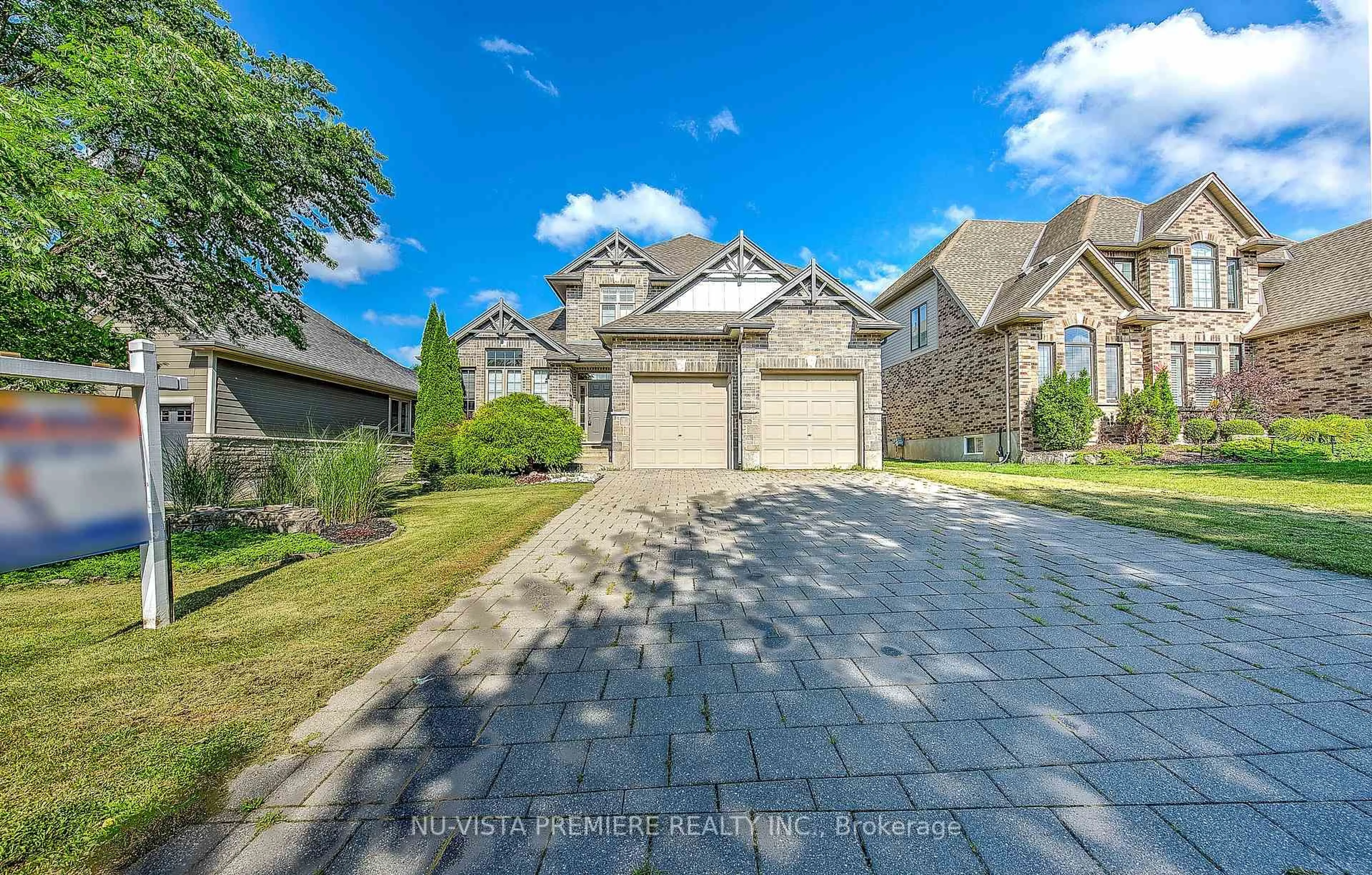 A pic from outside/outdoor area/front of a property/back of a property/a pic from drone, street for 1750 TIGERLILY Rd, London South Ontario N6K 0A3