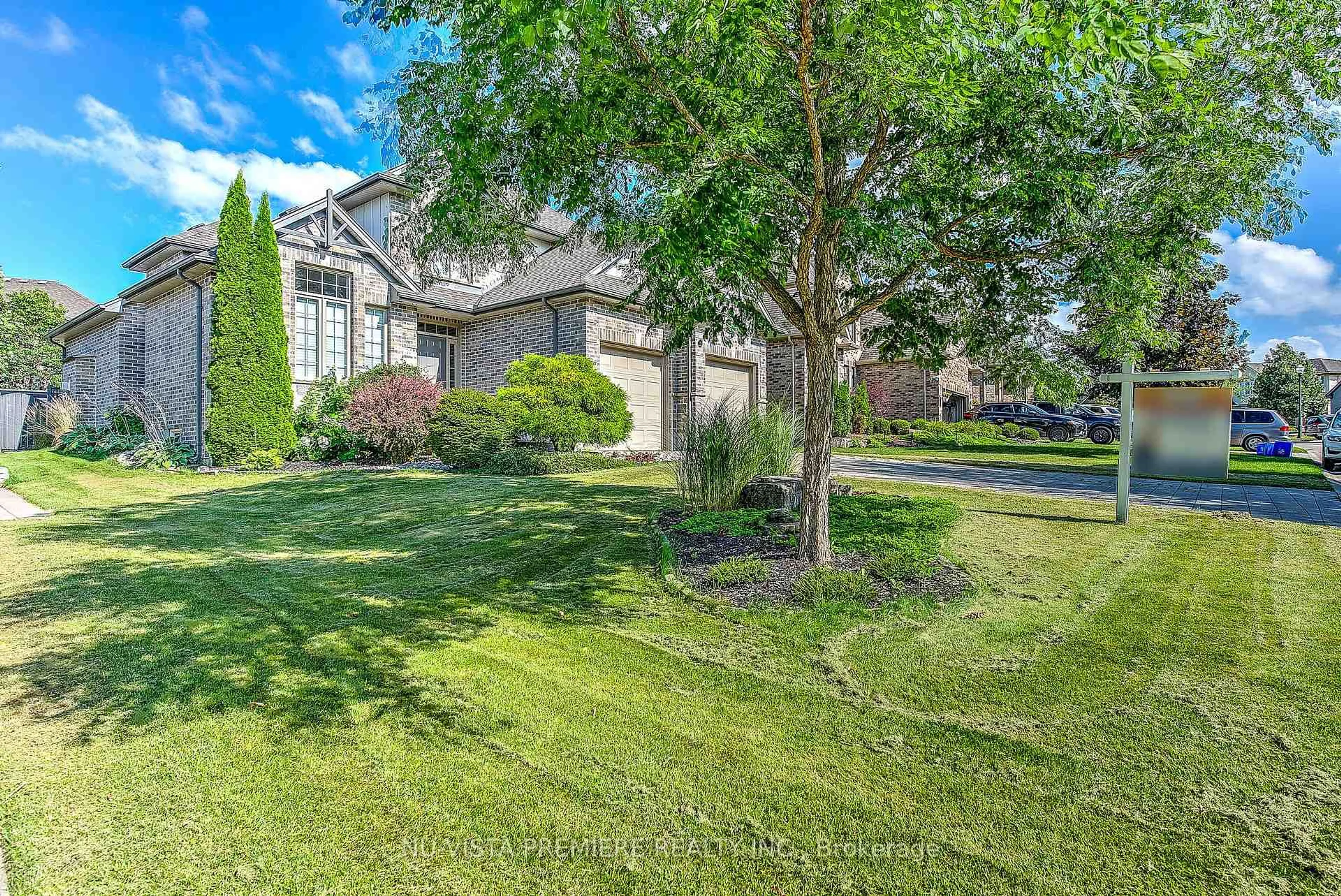 A pic from outside/outdoor area/front of a property/back of a property/a pic from drone, street for 1750 TIGERLILY Rd, London South Ontario N6K 0A3