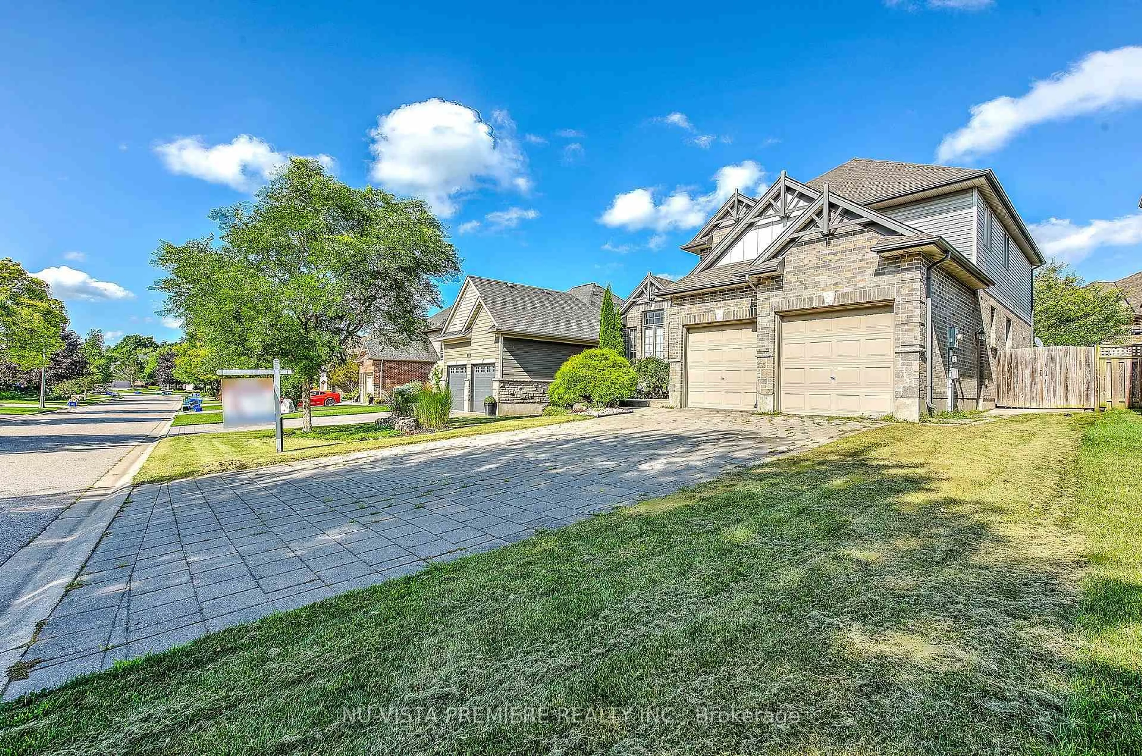 A pic from outside/outdoor area/front of a property/back of a property/a pic from drone, street for 1750 TIGERLILY Rd, London South Ontario N6K 0A3
