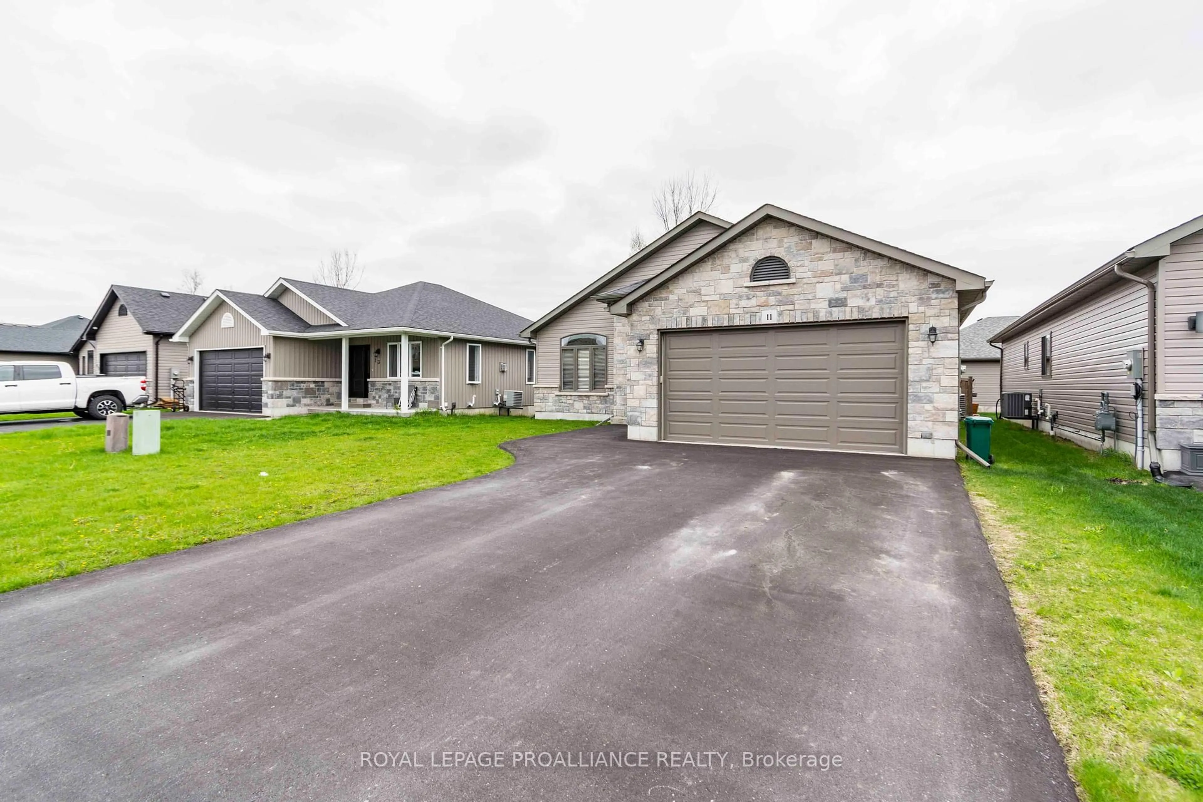 A pic from outside/outdoor area/front of a property/back of a property/a pic from drone, street for 11 Brookfield Cres, Quinte West Ontario K8V 0H9