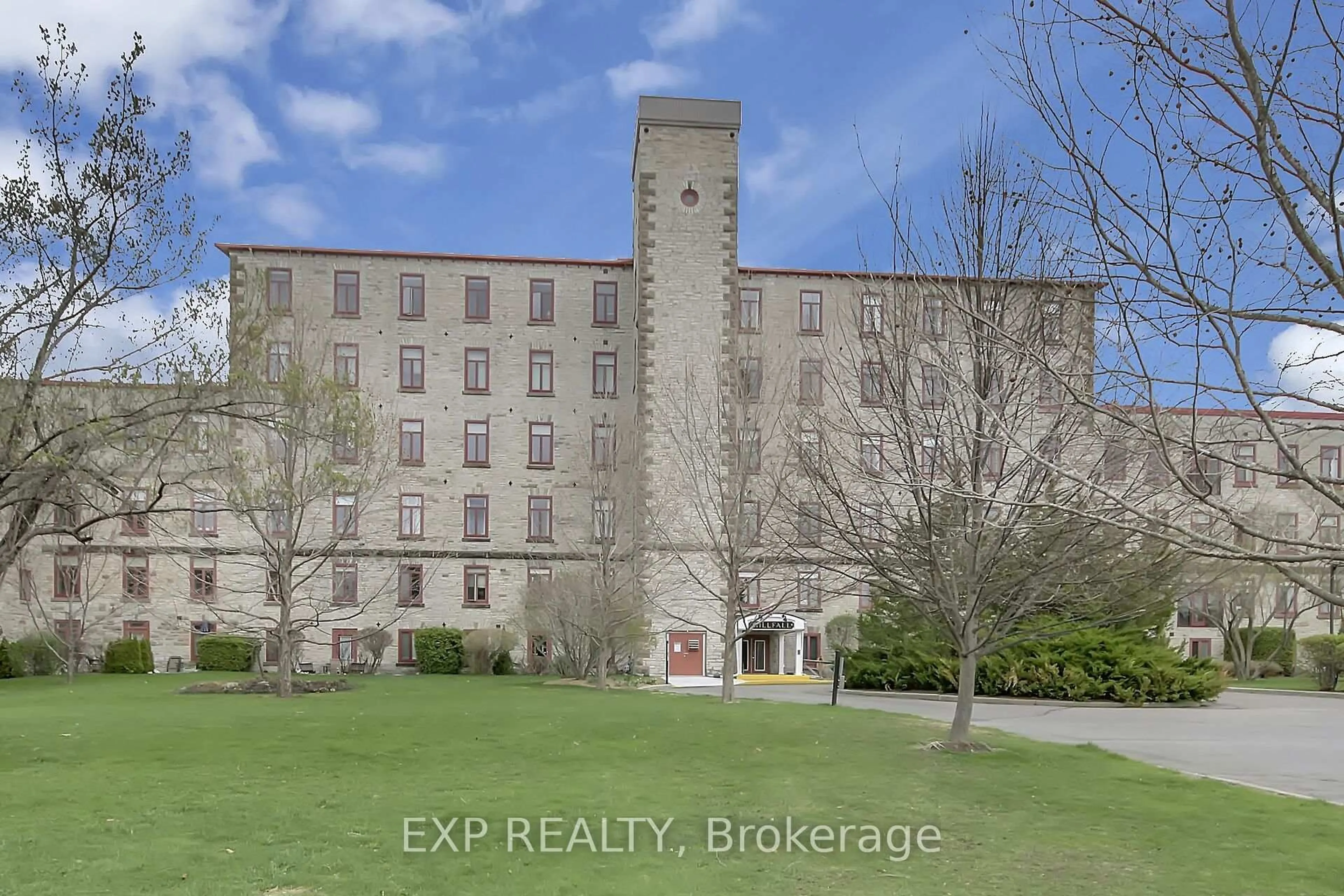A pic from outside/outdoor area/front of a property/back of a property/a pic from drone, building for 1 Rosamond St #211, Almonte Ontario K0A 1A0