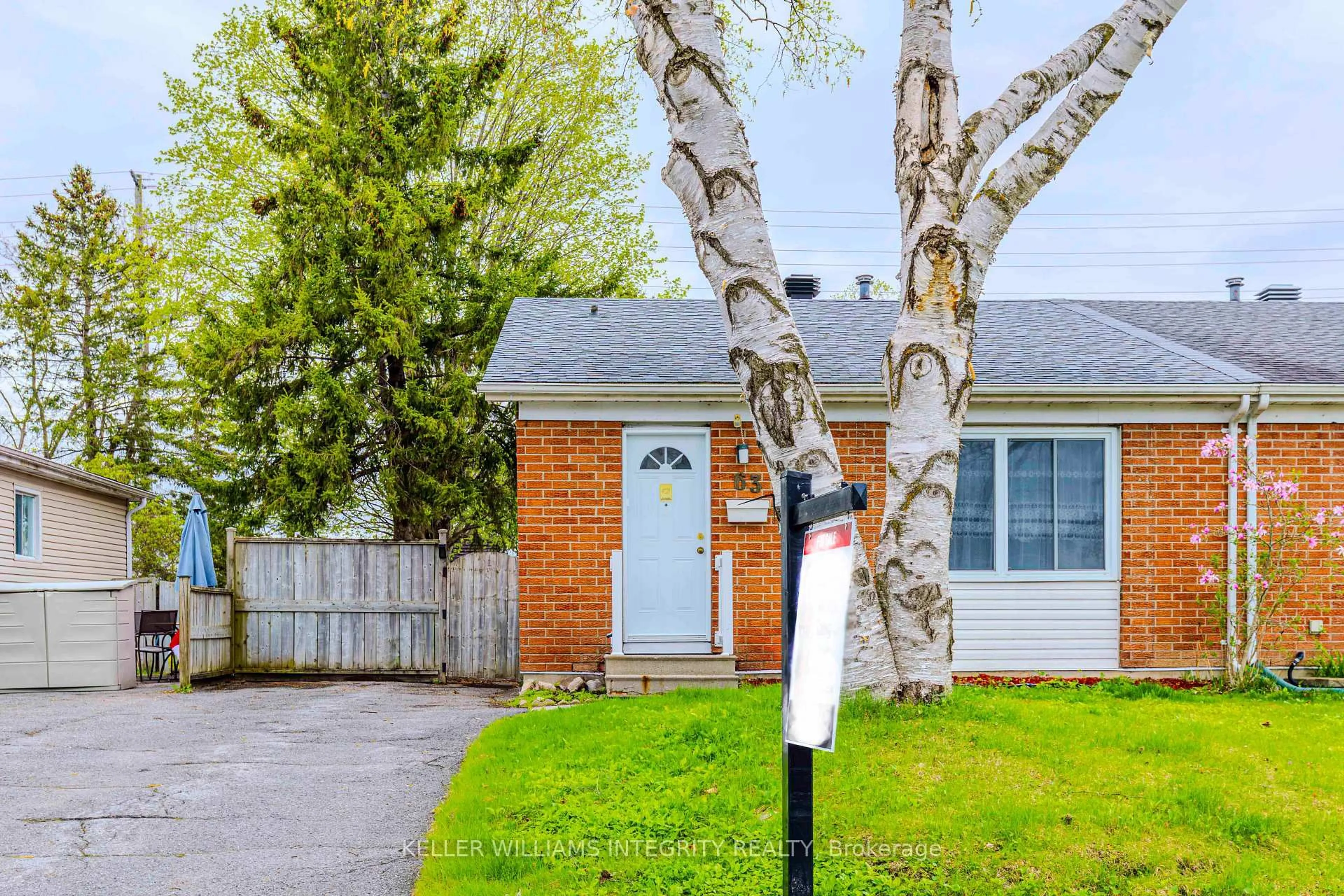 Home with brick exterior material, street for 63 Morton Dr, Ottawa Ontario K2L 1W9