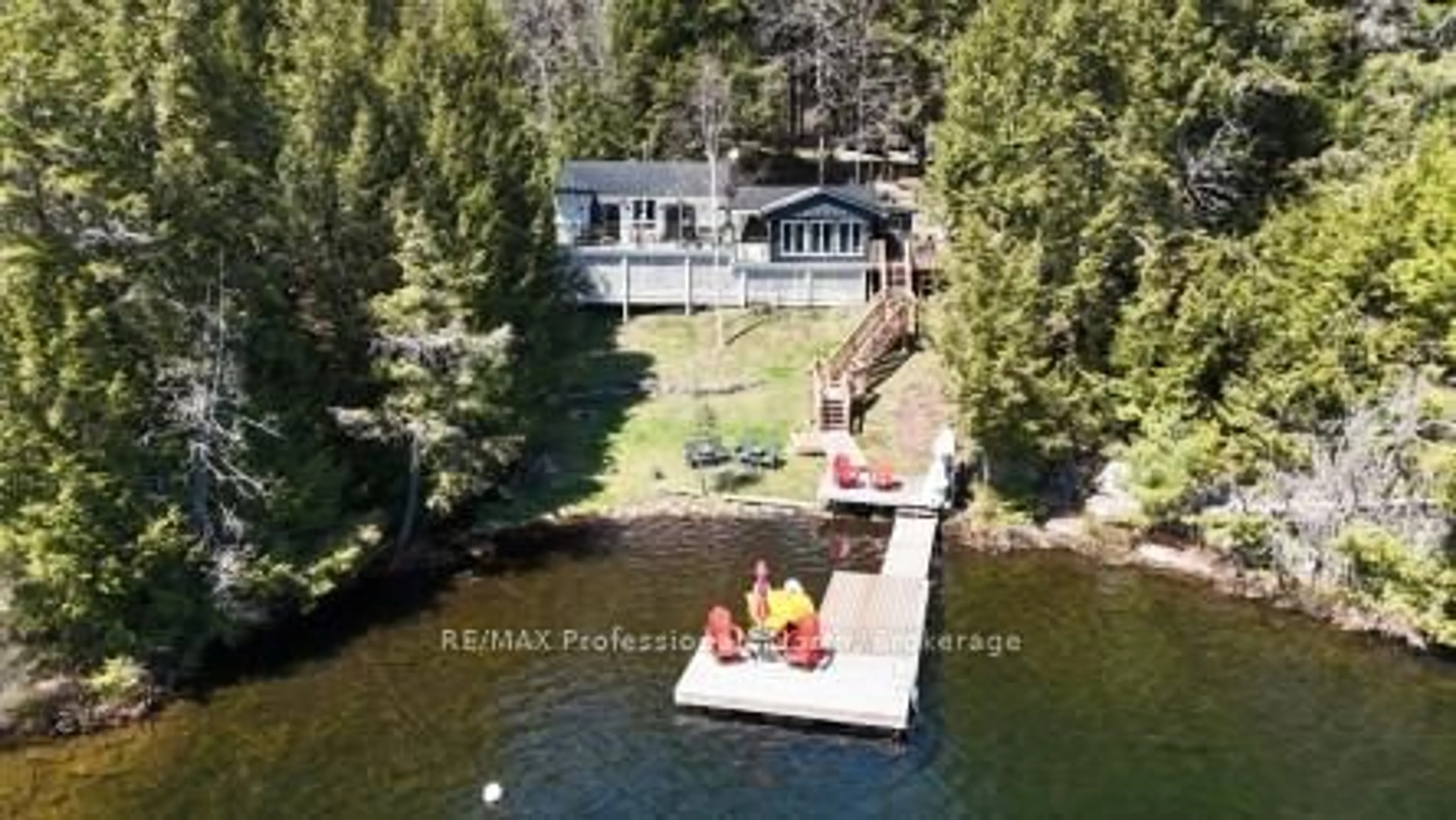 A pic from outside/outdoor area/front of a property/back of a property/a pic from drone, water/lake/river/ocean view for 1352 Bitter Lake Rd, Dysart et al Ontario K0M 2S0