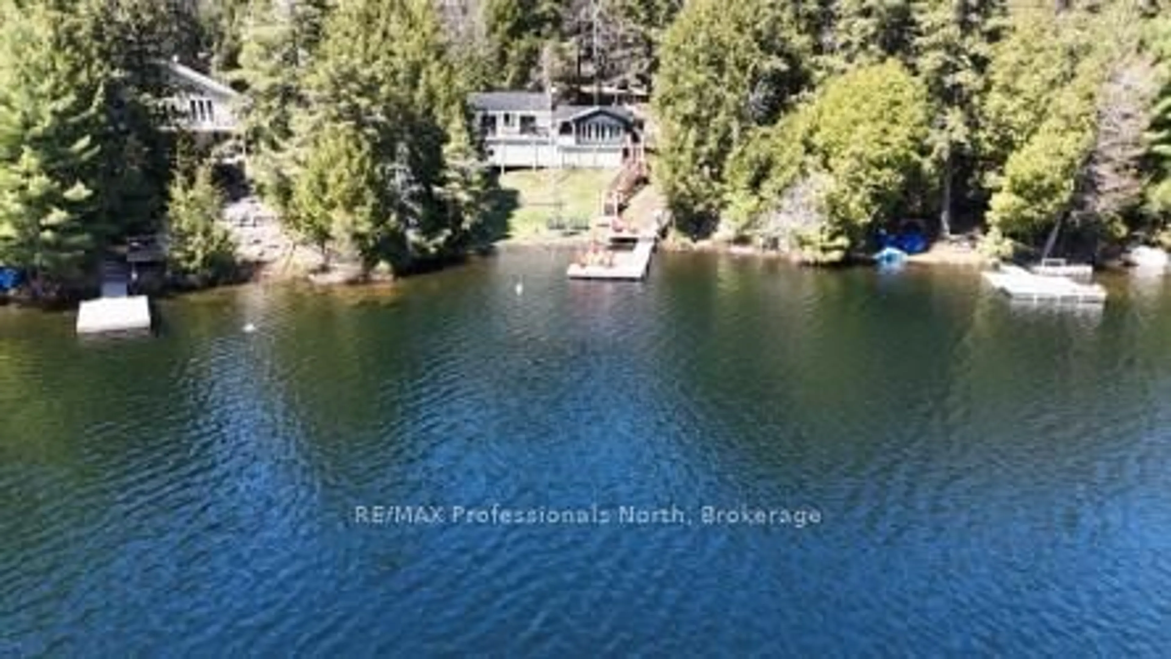 A pic from outside/outdoor area/front of a property/back of a property/a pic from drone, water/lake/river/ocean view for 1352 Bitter Lake Rd, Dysart et al Ontario K0M 2S0