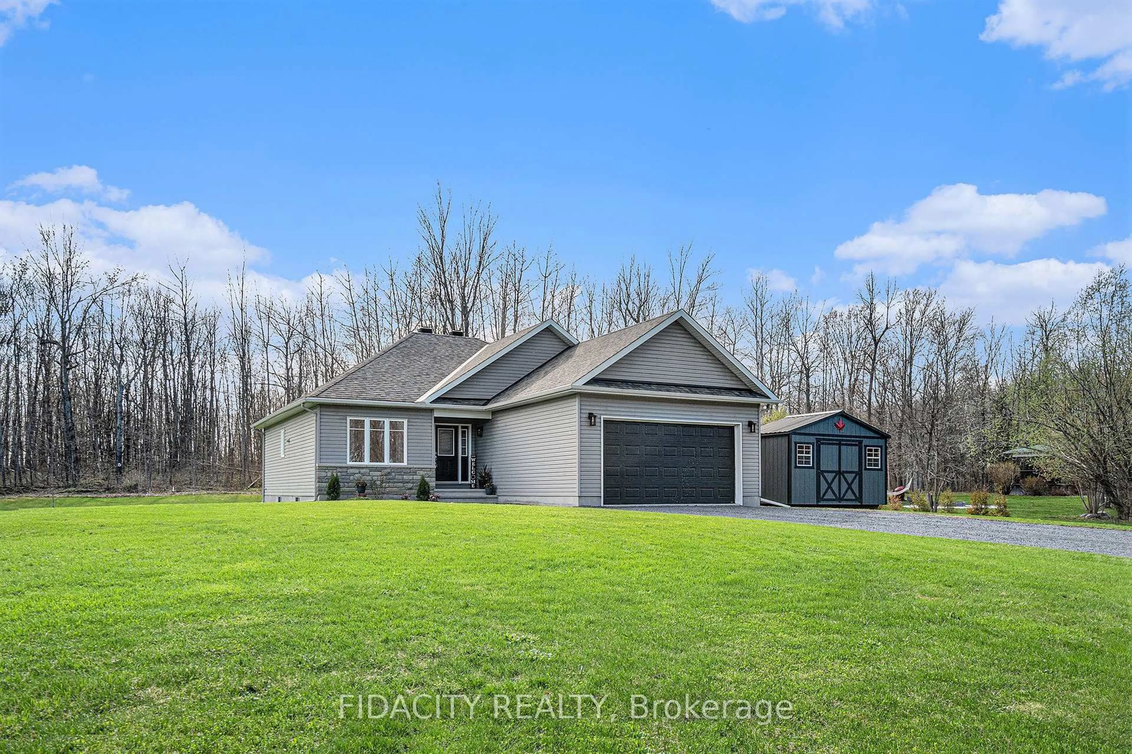 A pic from outside/outdoor area/front of a property/back of a property/a pic from drone, water/lake/river/ocean view for 2010 Thibault Crt, North Dundas Ontario K0C 1H0