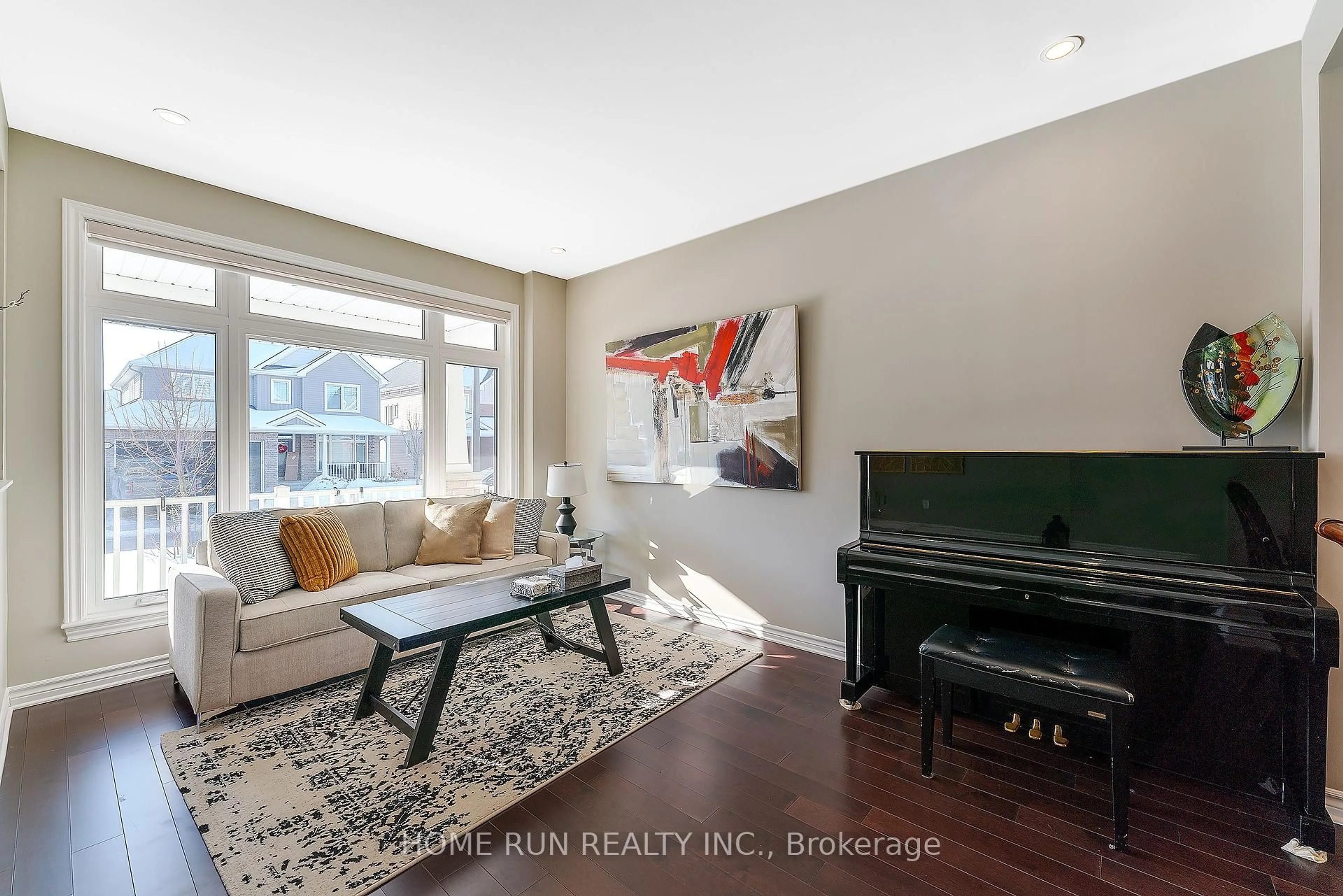 Living room with furniture, wood/laminate floor for 2838 Grand Canal St, Ottawa Ontario K2J 6E4